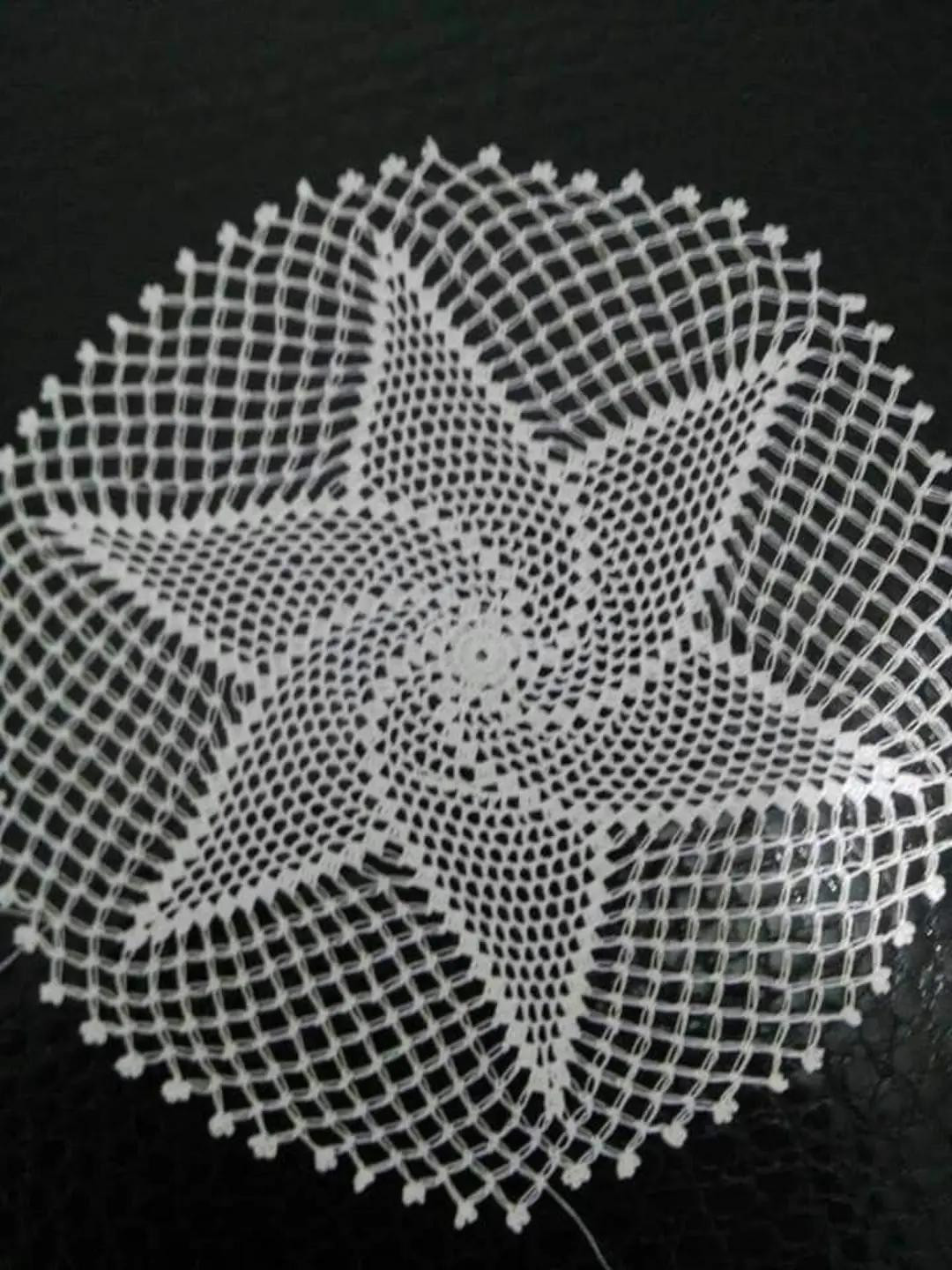 Crochet chart for sunflower and peacock feather round motifs with detailed stitch diagram