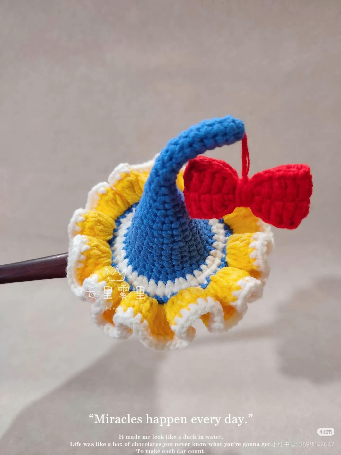 Crochet Elf Hat Pattern with Ruffled Brim and Red Bow