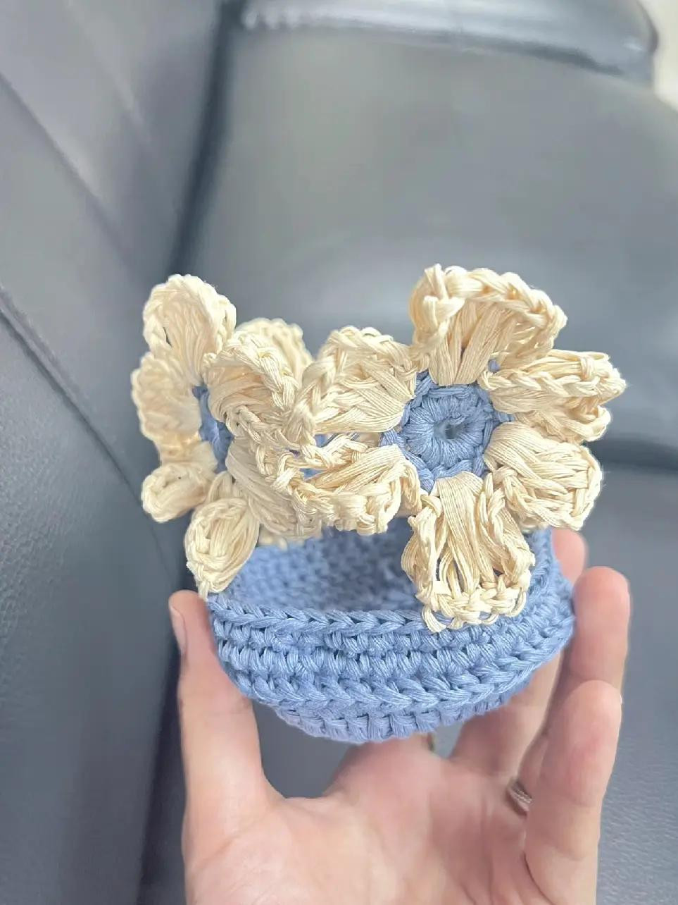 Crochet Flower Cup Holder Pattern with Blue and Cream Ruffles