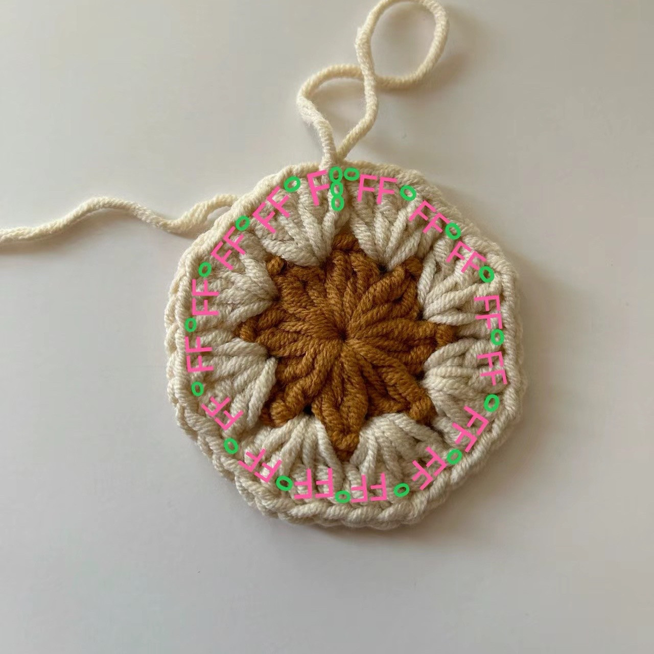 Crochet Flower Granny Square Pattern Chart with Step-by-Step Instructions in Red, White, and Brown Yarn