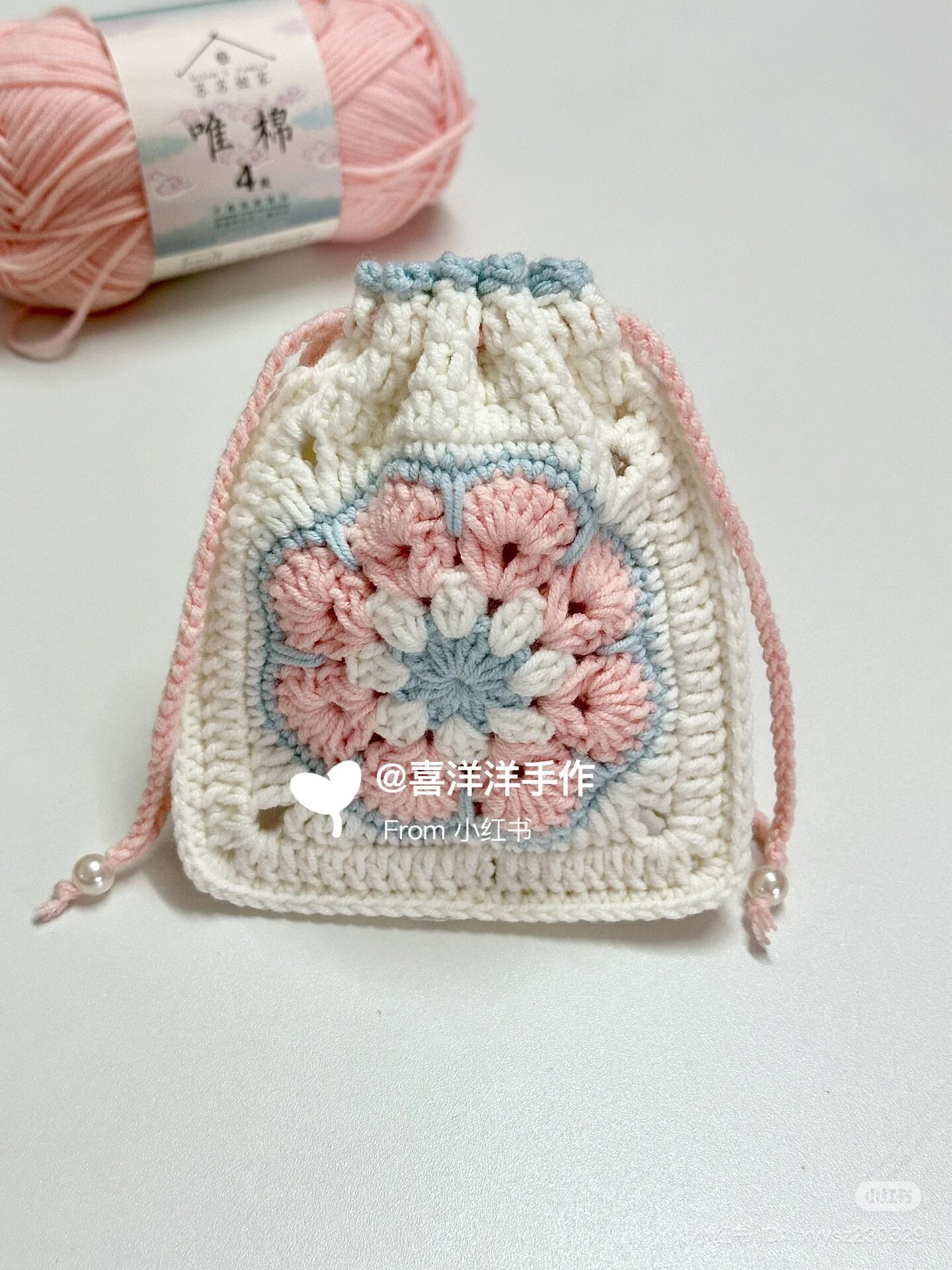 Crochet Flower Square Pattern for Drawstring Bag with Pink, Blue and White Yarn