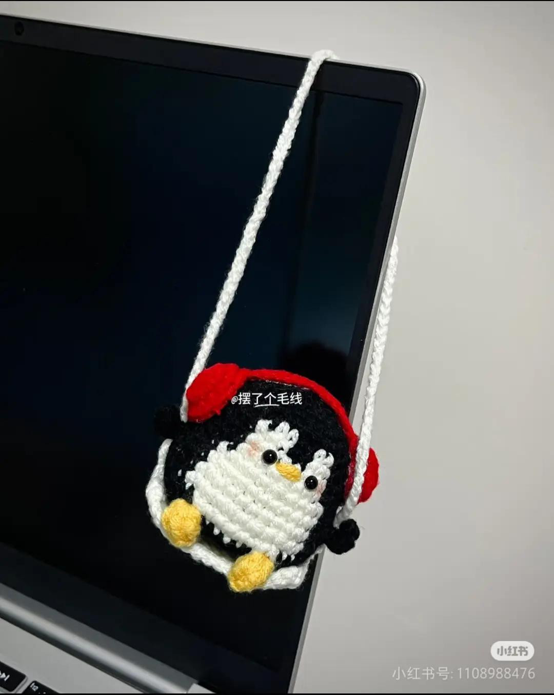 Crochet Pattern: Cute Penguin on a Swing with Red Earmuffs