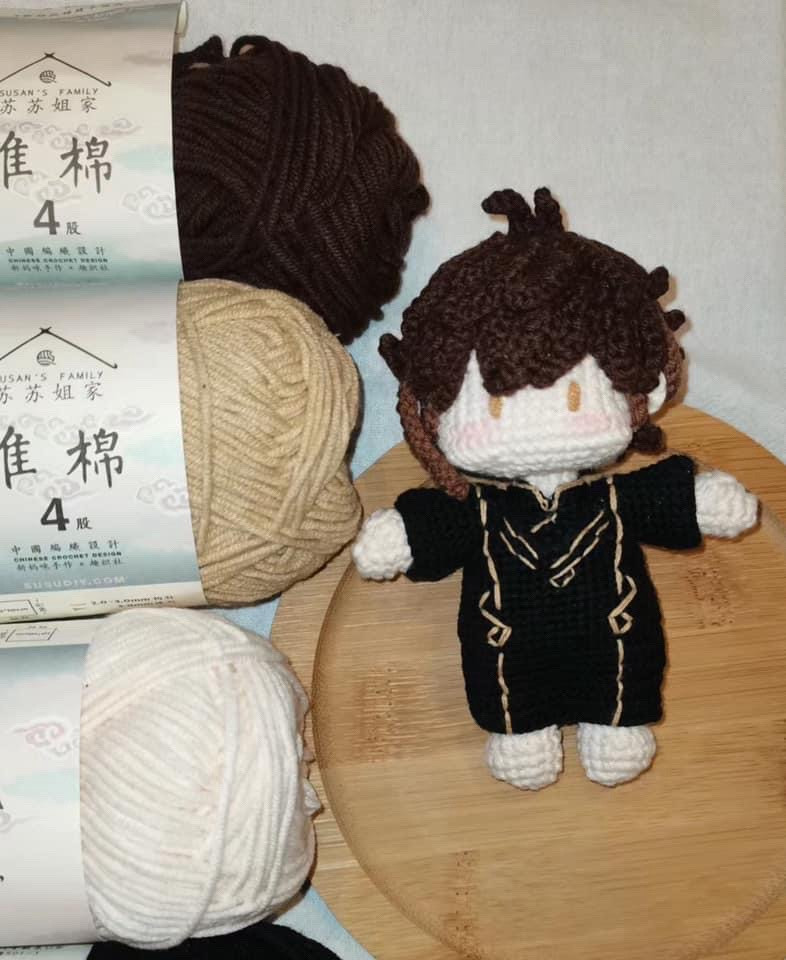 Crochet Pattern for Cute Amigurumi Boy with Purple Vest