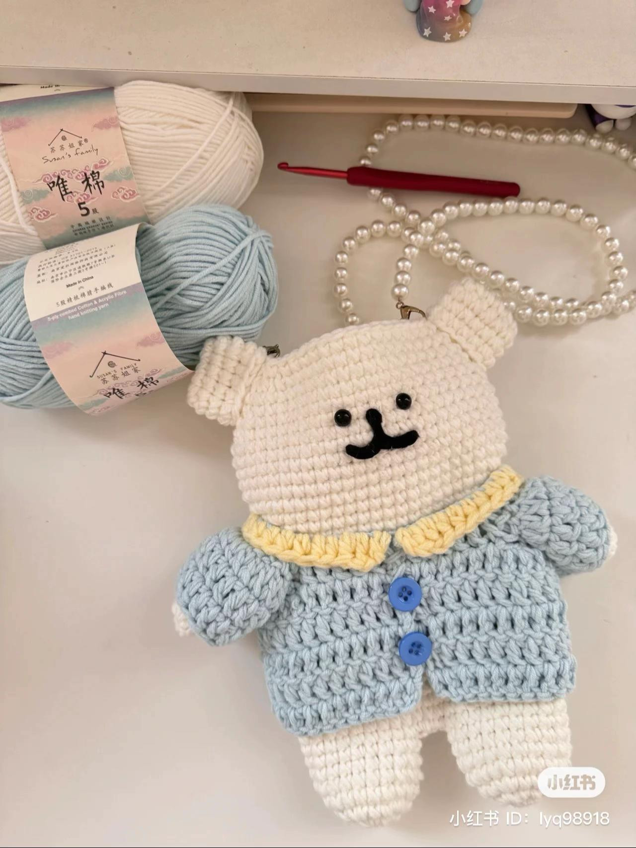 Crochet Pattern for Cute White Dog Jojo with Blue Jacket and Yellow Collar