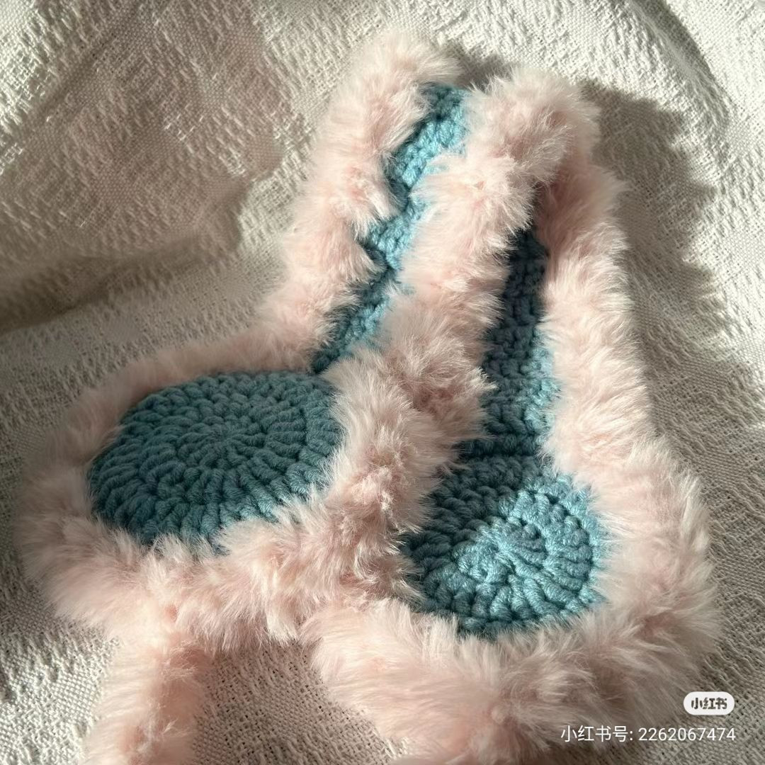 Crochet pattern for pink and blue fluffy ear warmers