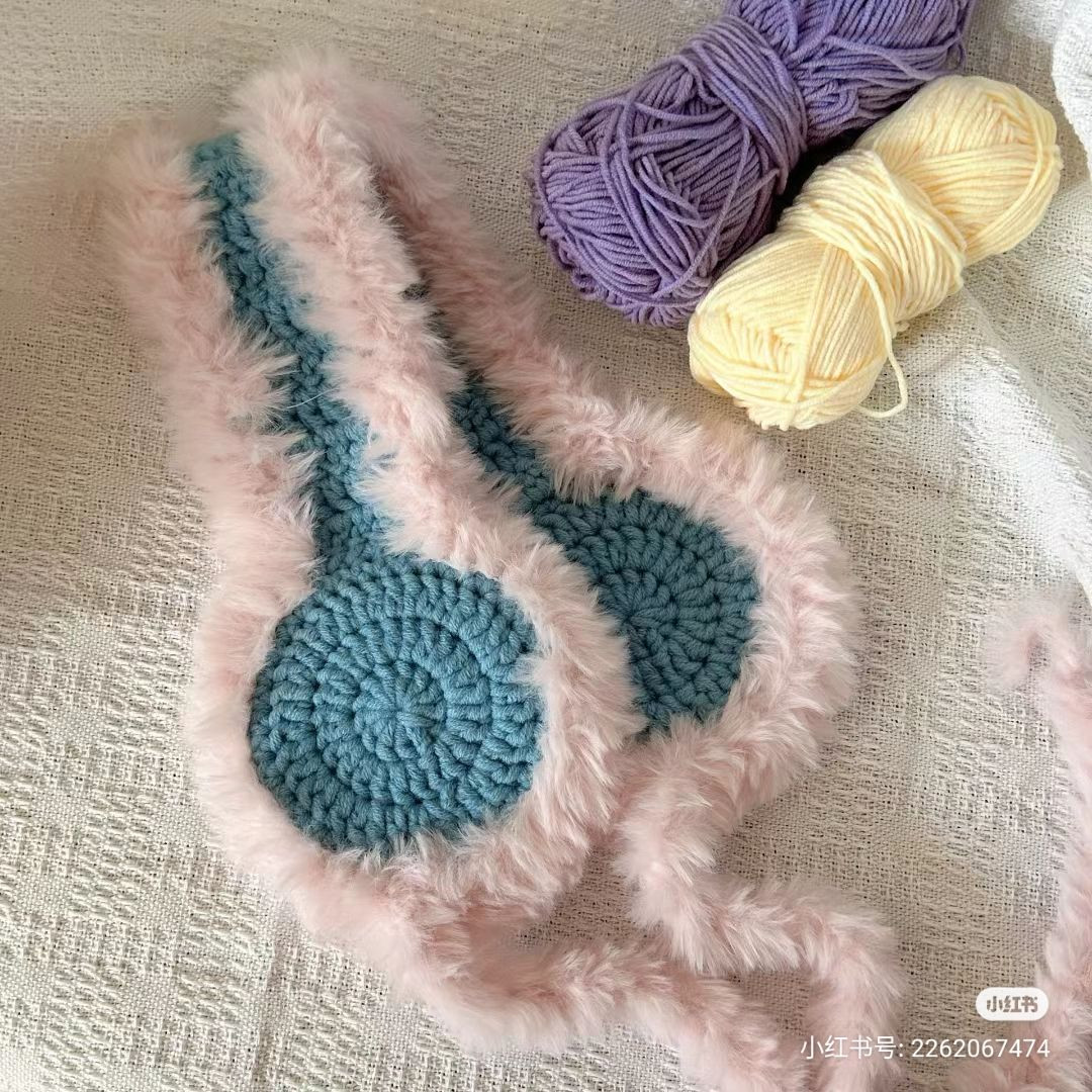 Crochet pattern for pink and blue fluffy ear warmers