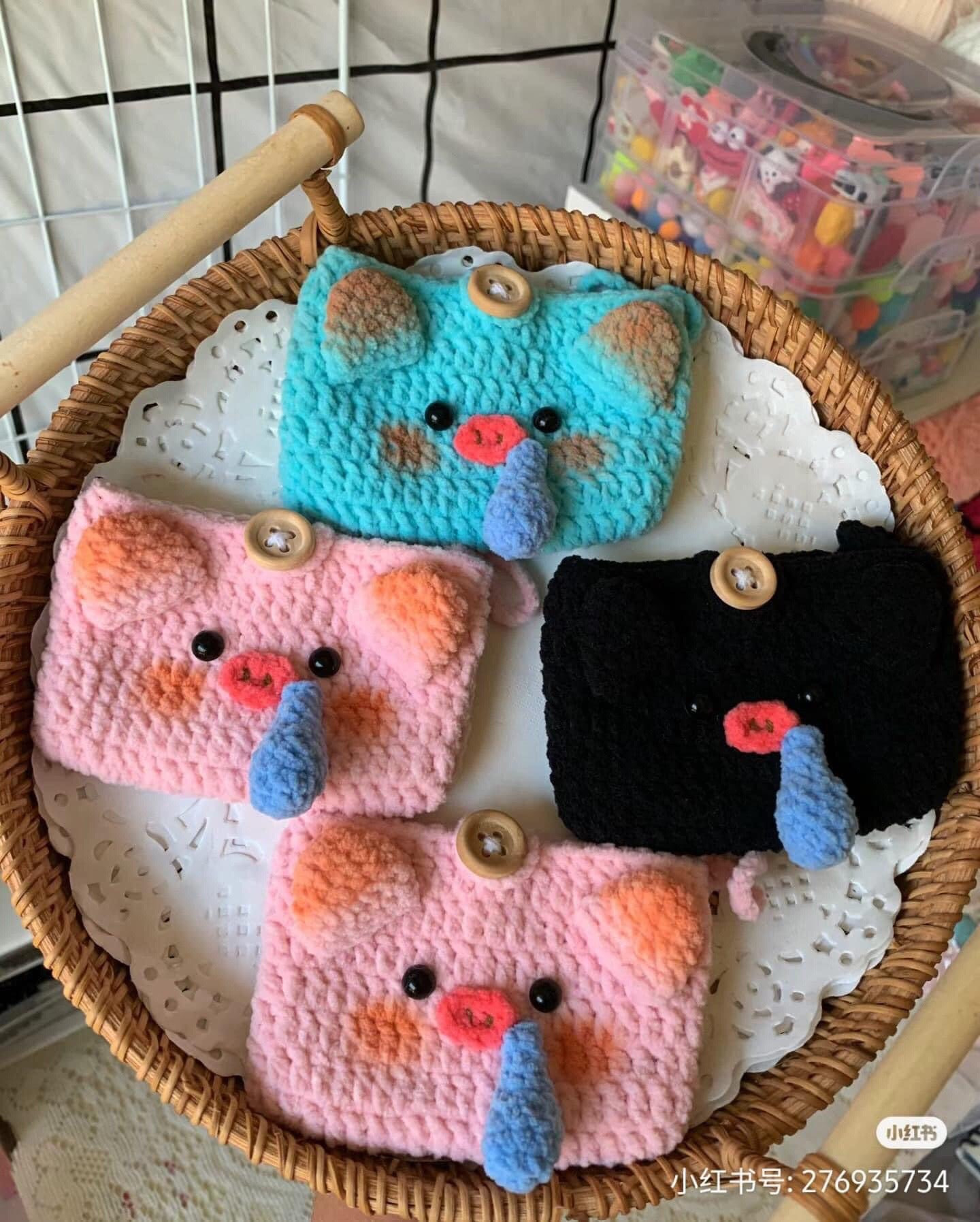 Crochet Pattern Tutorial for Cute Snot Pig Cozies in Pink, Blue, and Black with Button Details