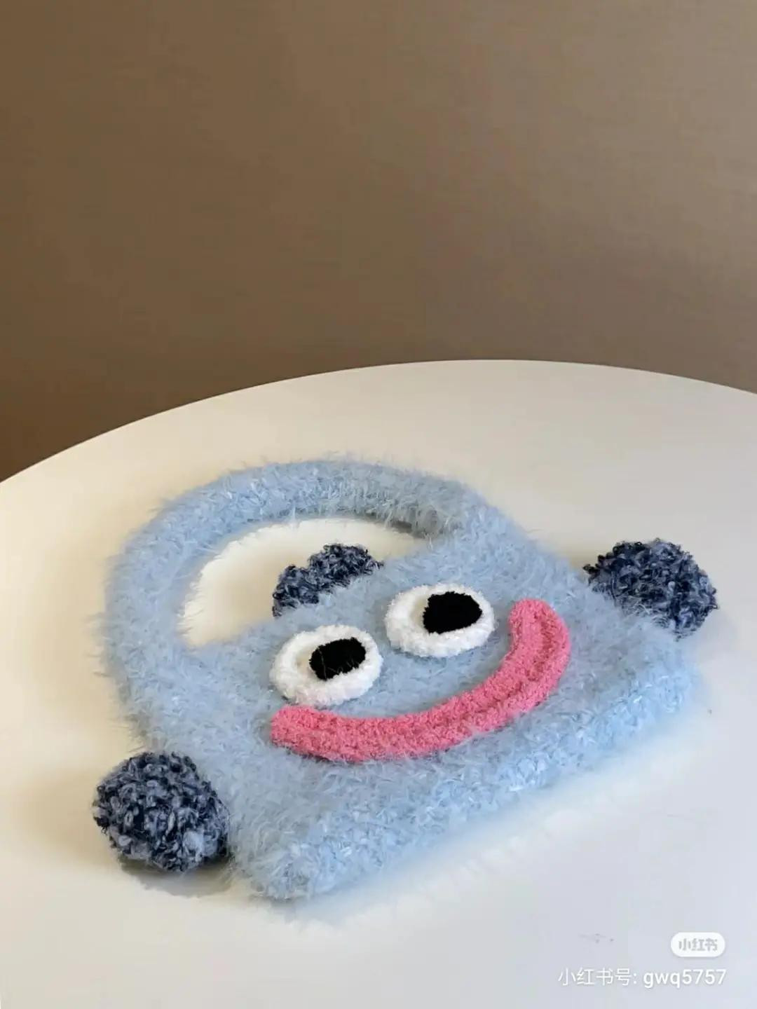 Cute Blue Fish Monster Crochet Bag Pattern Chart with Pink Smile and Fuzzy Texture