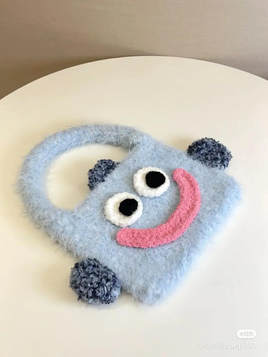 Cute Blue Fish Monster Crochet Bag Pattern Chart with Pink Smile and Fuzzy Texture