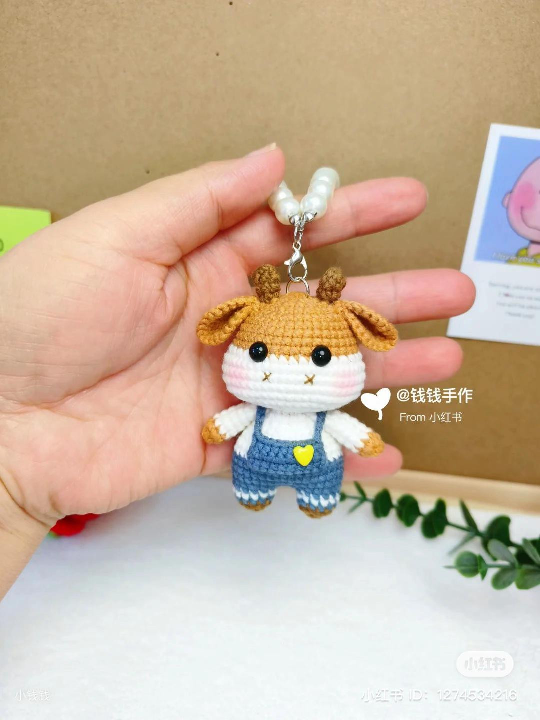 Cute Crochet Sheep Doll with Blue Overalls and Red Star Pattern