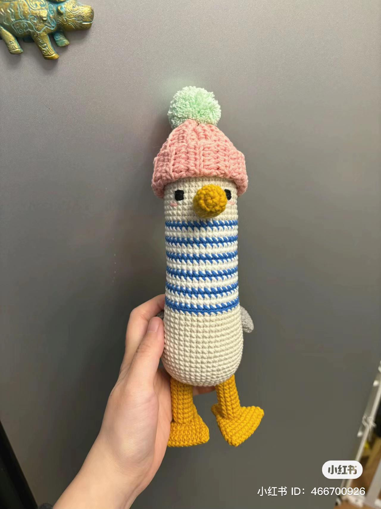 Cute Crocheted Penguin Doll with Pink Beanie and Blue Striped Body - Amigurumi Pattern