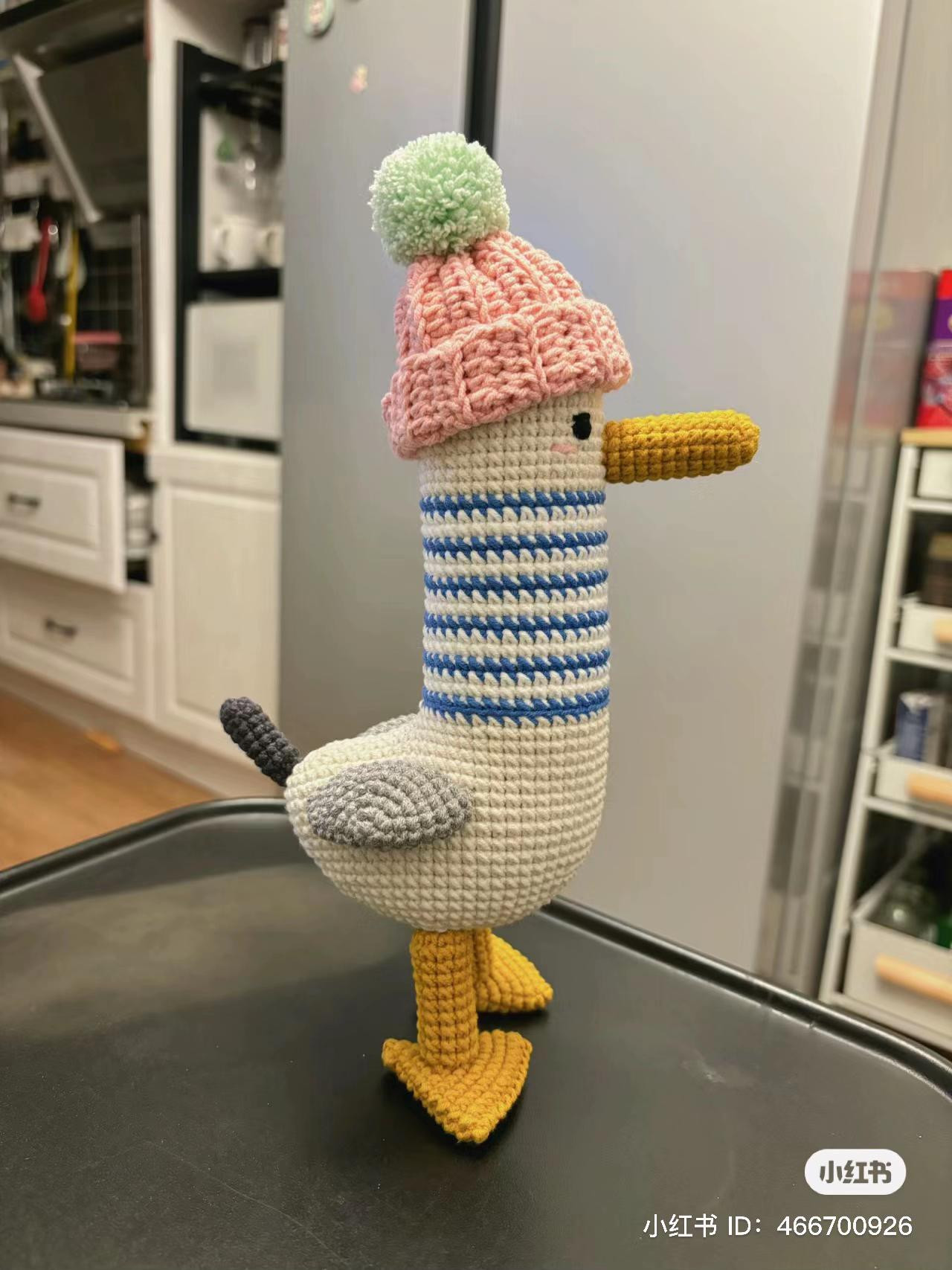 Cute Crocheted Penguin Doll with Pink Beanie and Blue Striped Body - Amigurumi Pattern