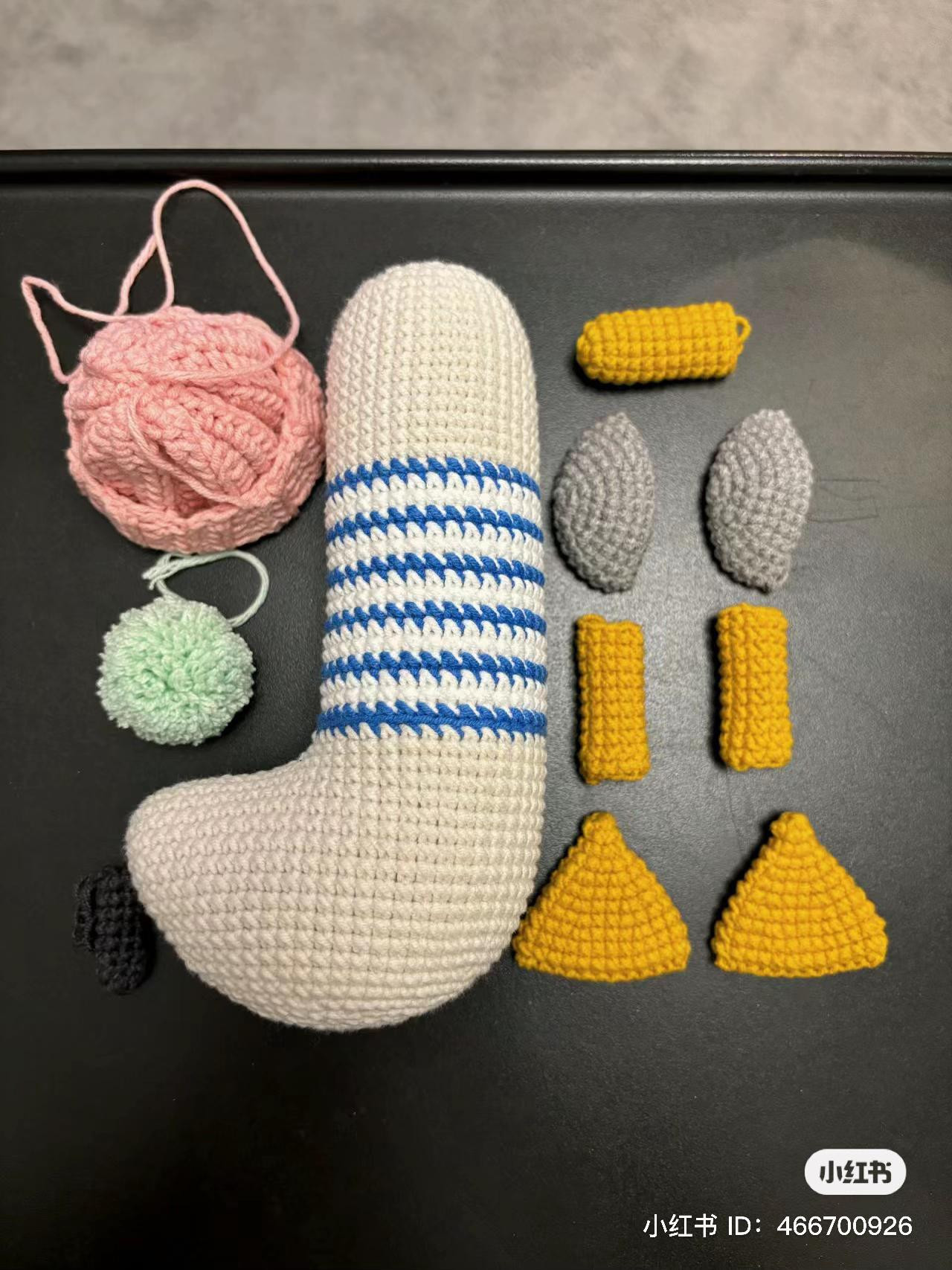 Cute Crocheted Penguin Doll with Pink Beanie and Blue Striped Body - Amigurumi Pattern