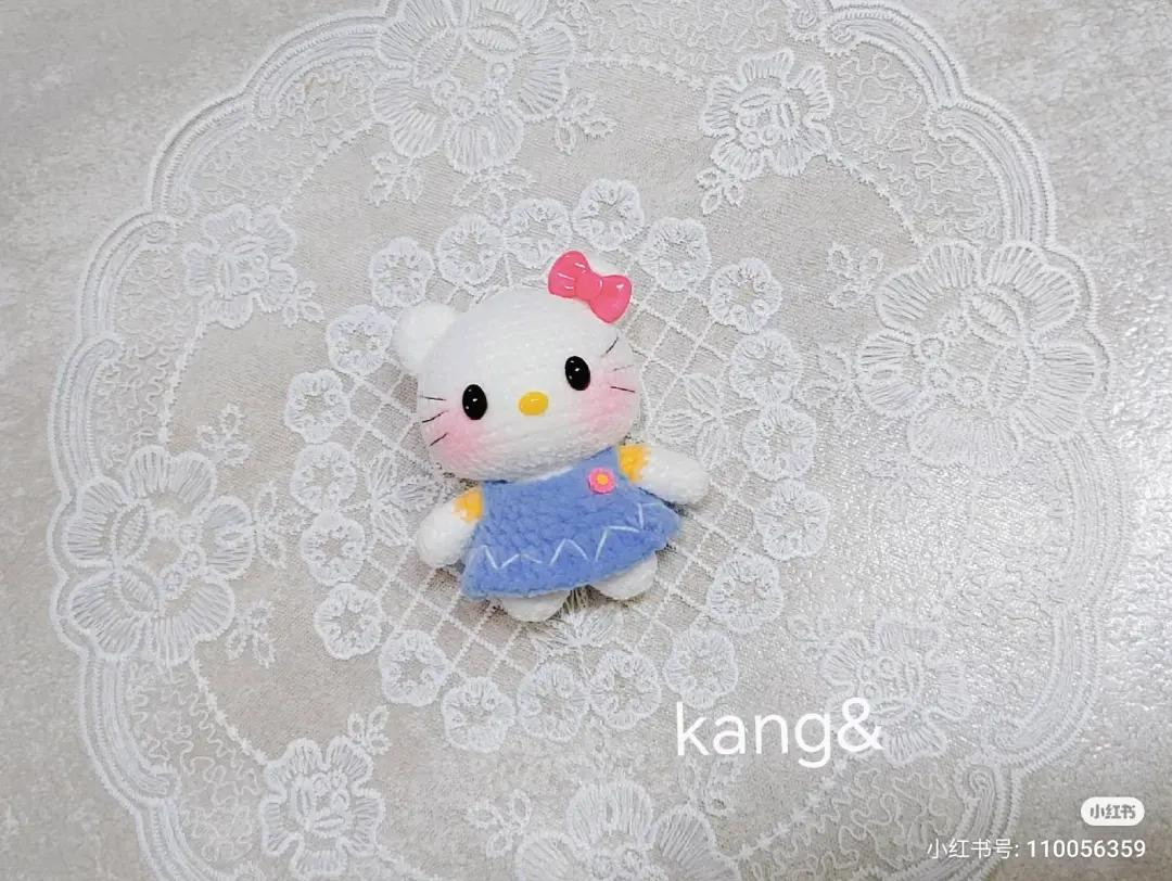 Cute Mini Crochet Hello Kitty Doll Amigurumi Pattern with Blue Dress and Pink Bow