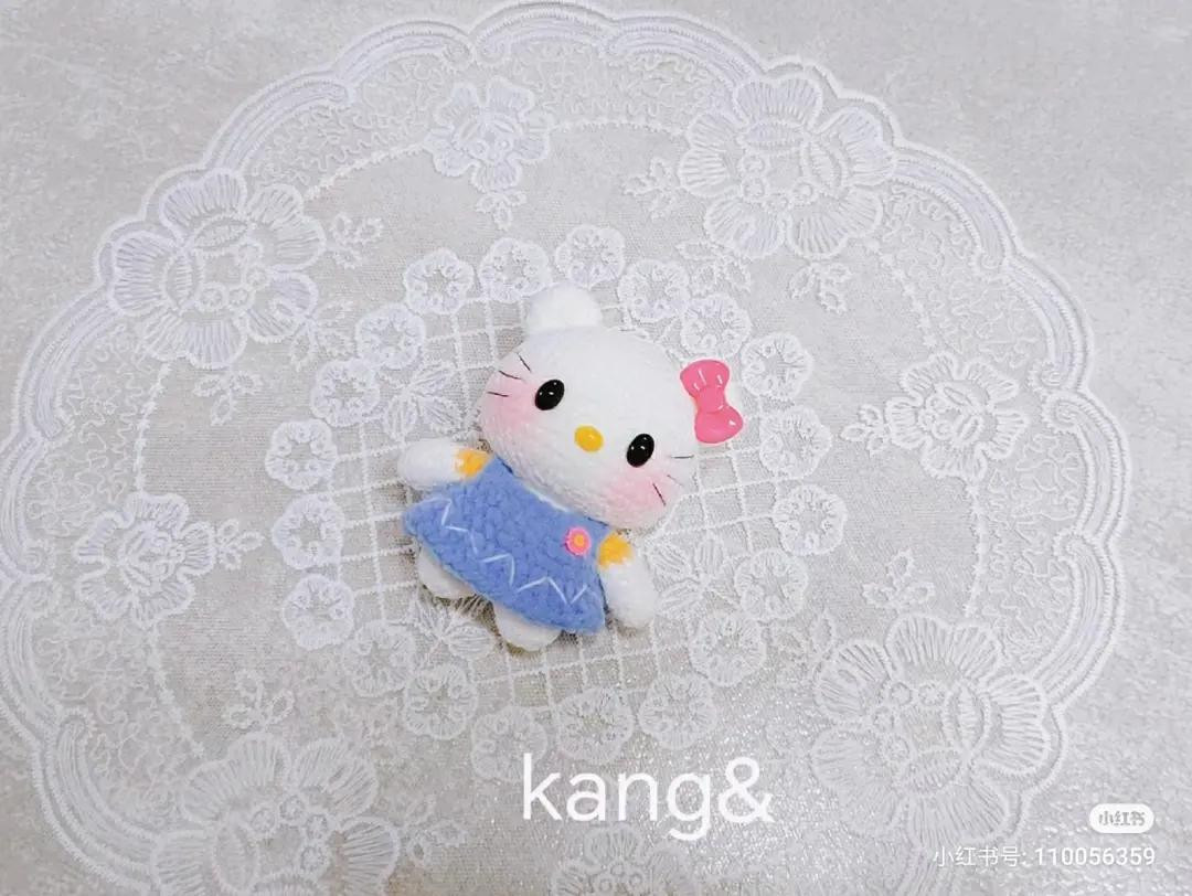 Cute Mini Crochet Hello Kitty Doll Amigurumi Pattern with Blue Dress and Pink Bow