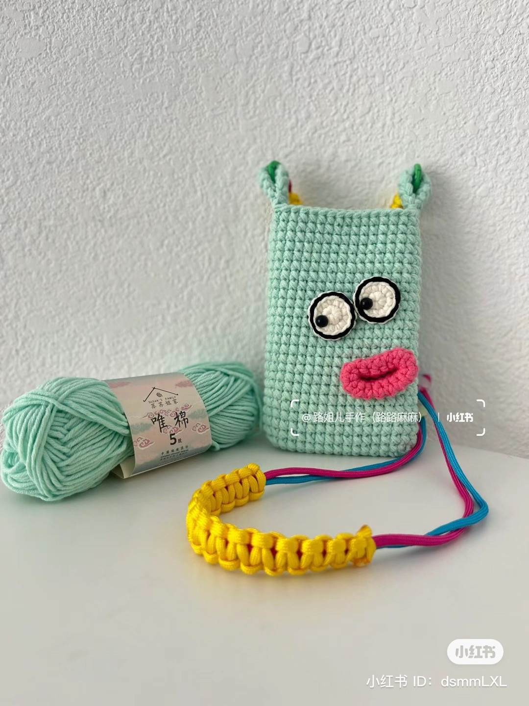 Cute Mint Green Crochet Monster Phone Bag Pattern with Big Eyes and Pink Lips