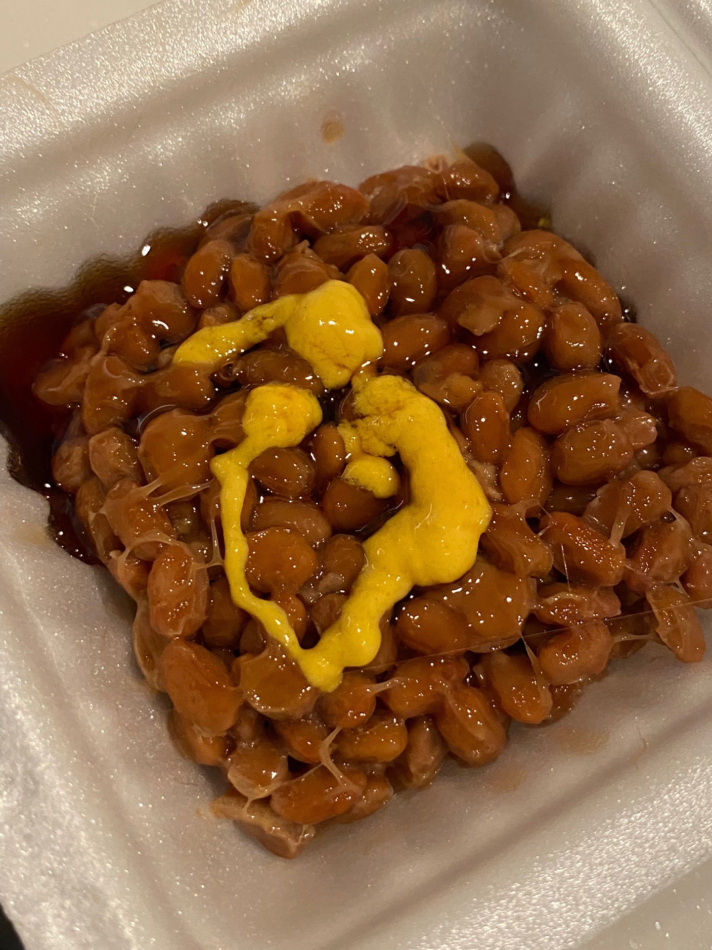 Delicious Natto Rice Bowl with Runny Onsen Egg and Mustard