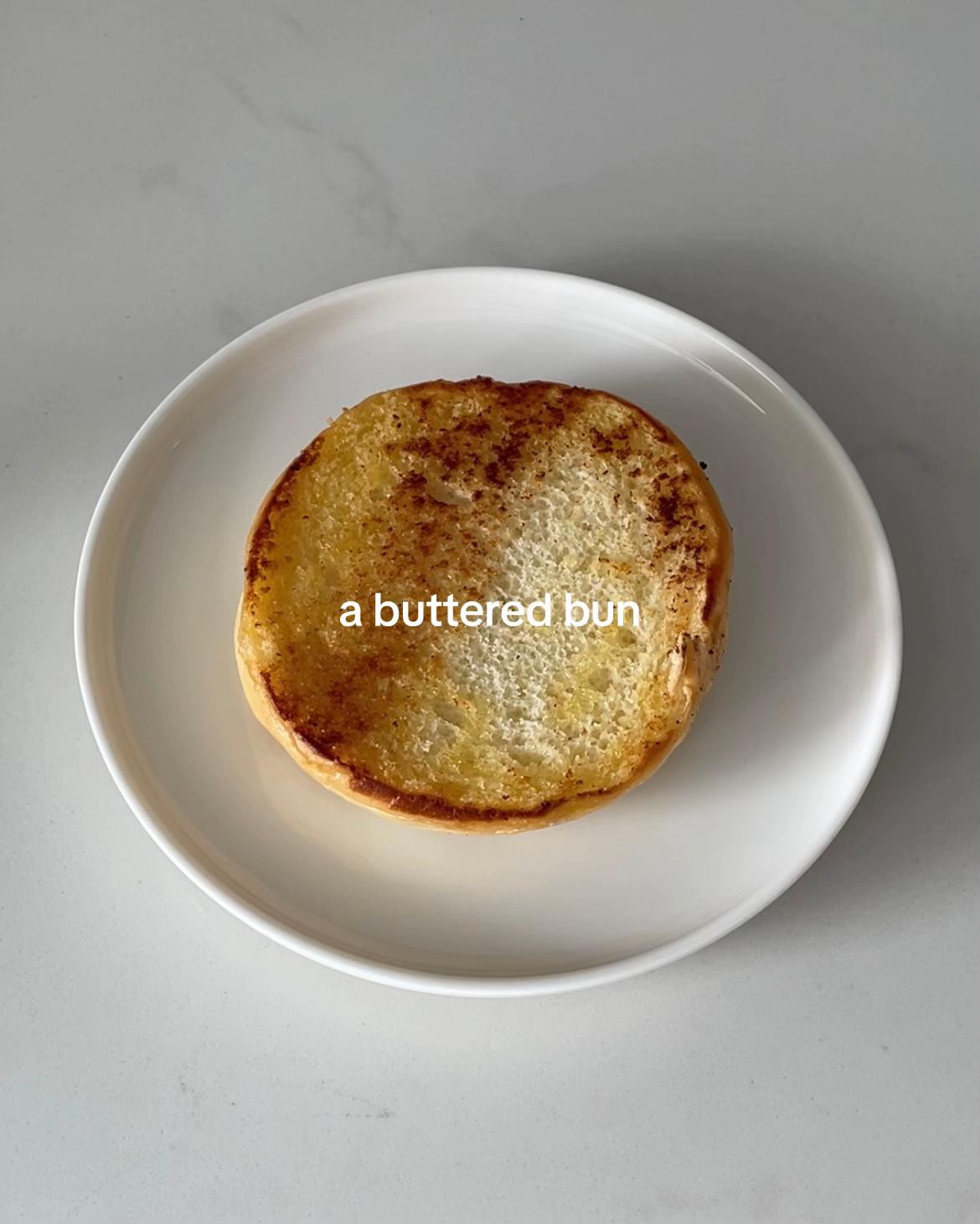 Easy Breakfast Bun with Scrambled Eggs, Melted Cheese, Kewpie Mayo, and Chili Flakes