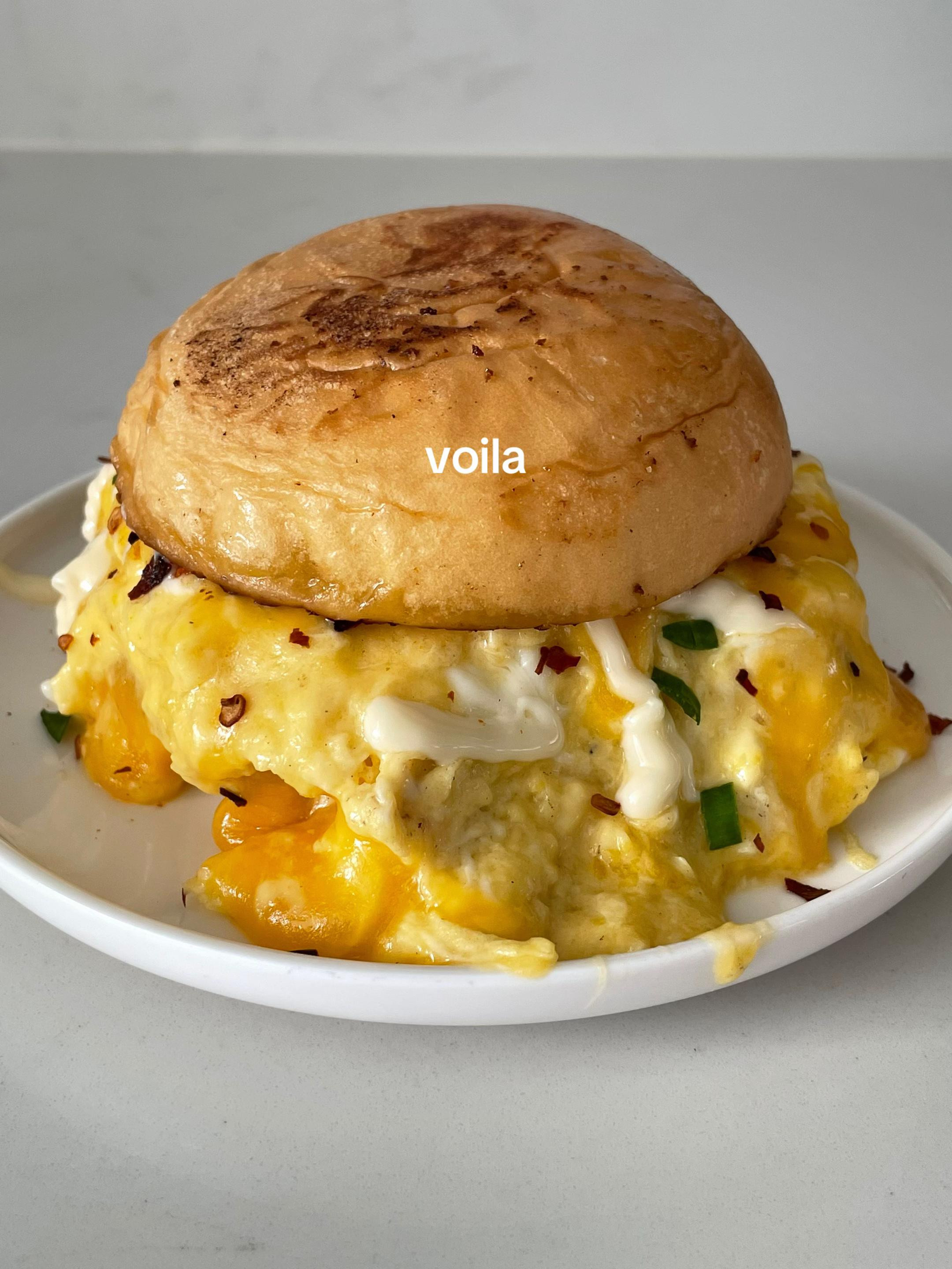 Easy Breakfast Bun with Scrambled Eggs, Melted Cheese, Kewpie Mayo, and Chili Flakes