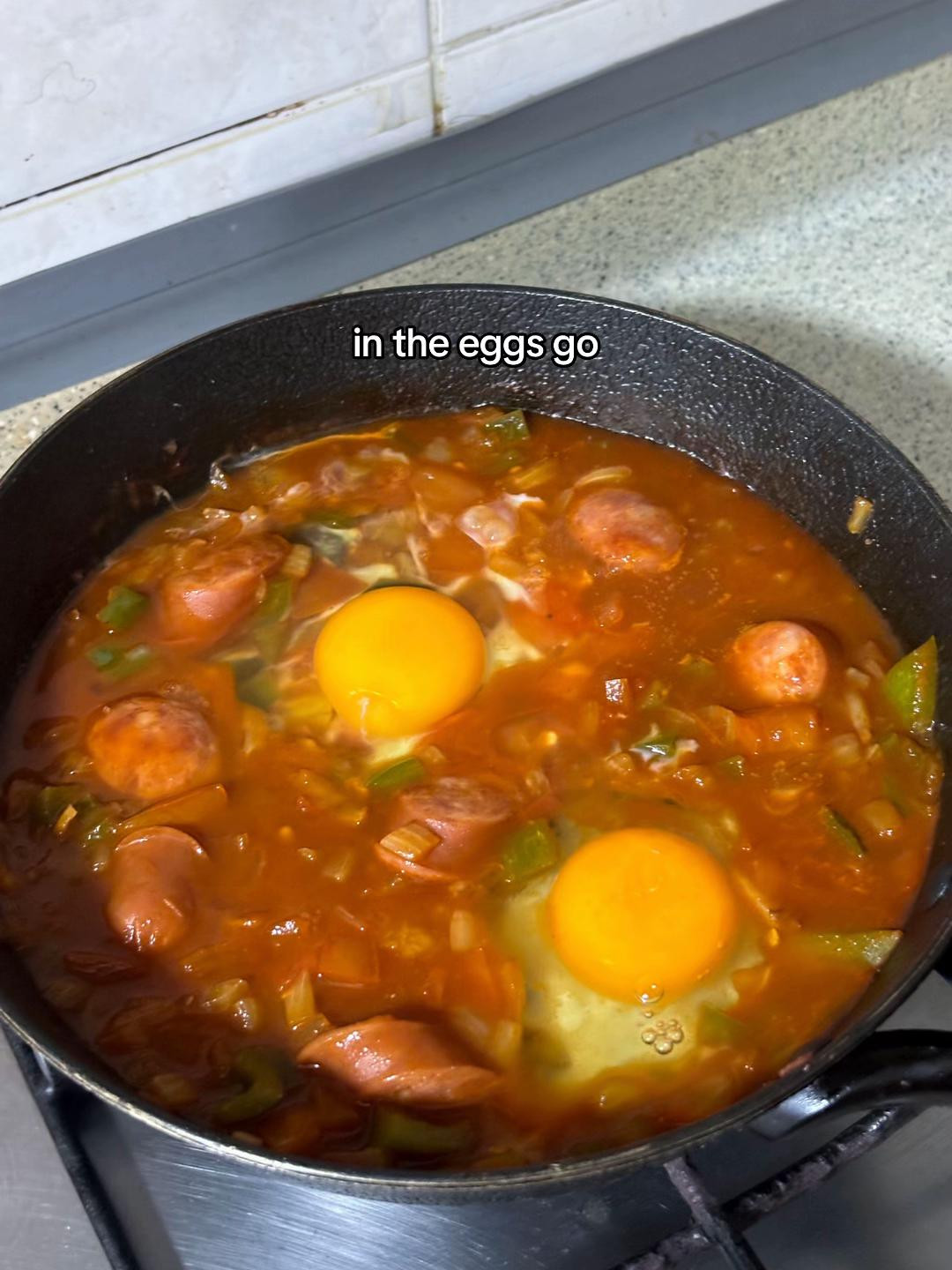Easy One-Pan Shakshuka with Sausage, Eggs, and Fresh Vegetables
