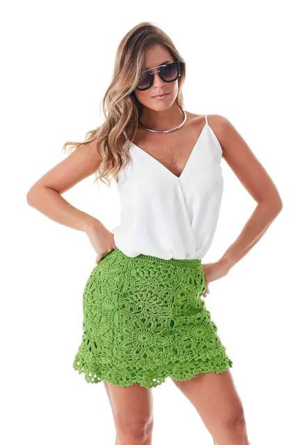 Esquema de distribuição e diagramas para saia verde com padrão floral