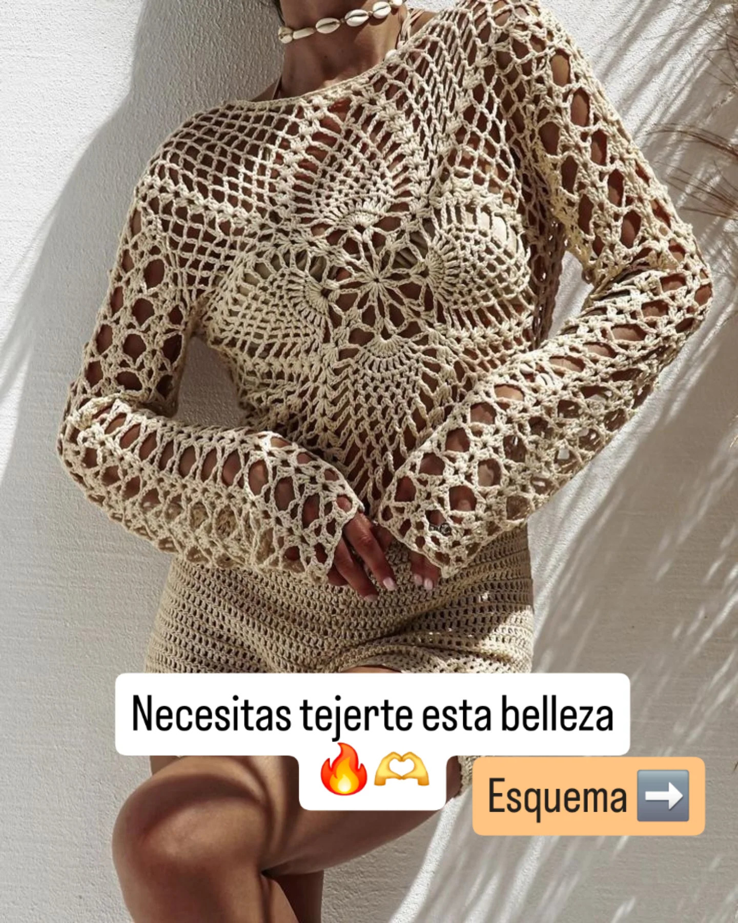 Esquema de suéter crochet con diseño floral y mangas largas