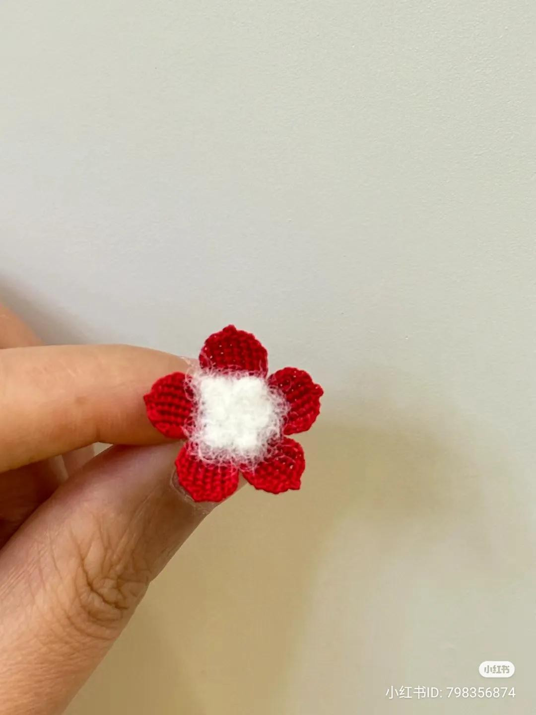 Hand-drawn crochet chart pattern for small flower petals and center