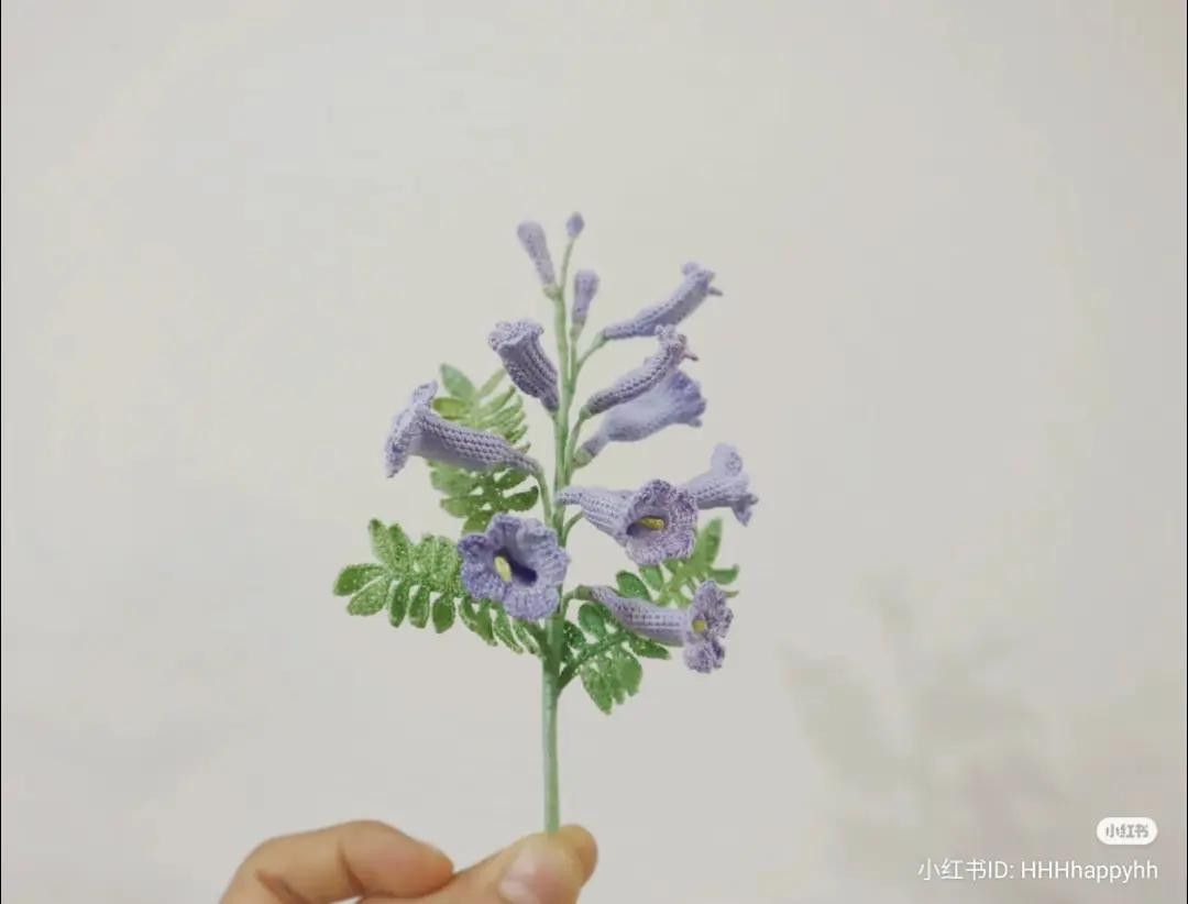 Handwritten Crochet Pattern Tutorial for Blue Delphinium Flower with Detailed Stitch Diagrams