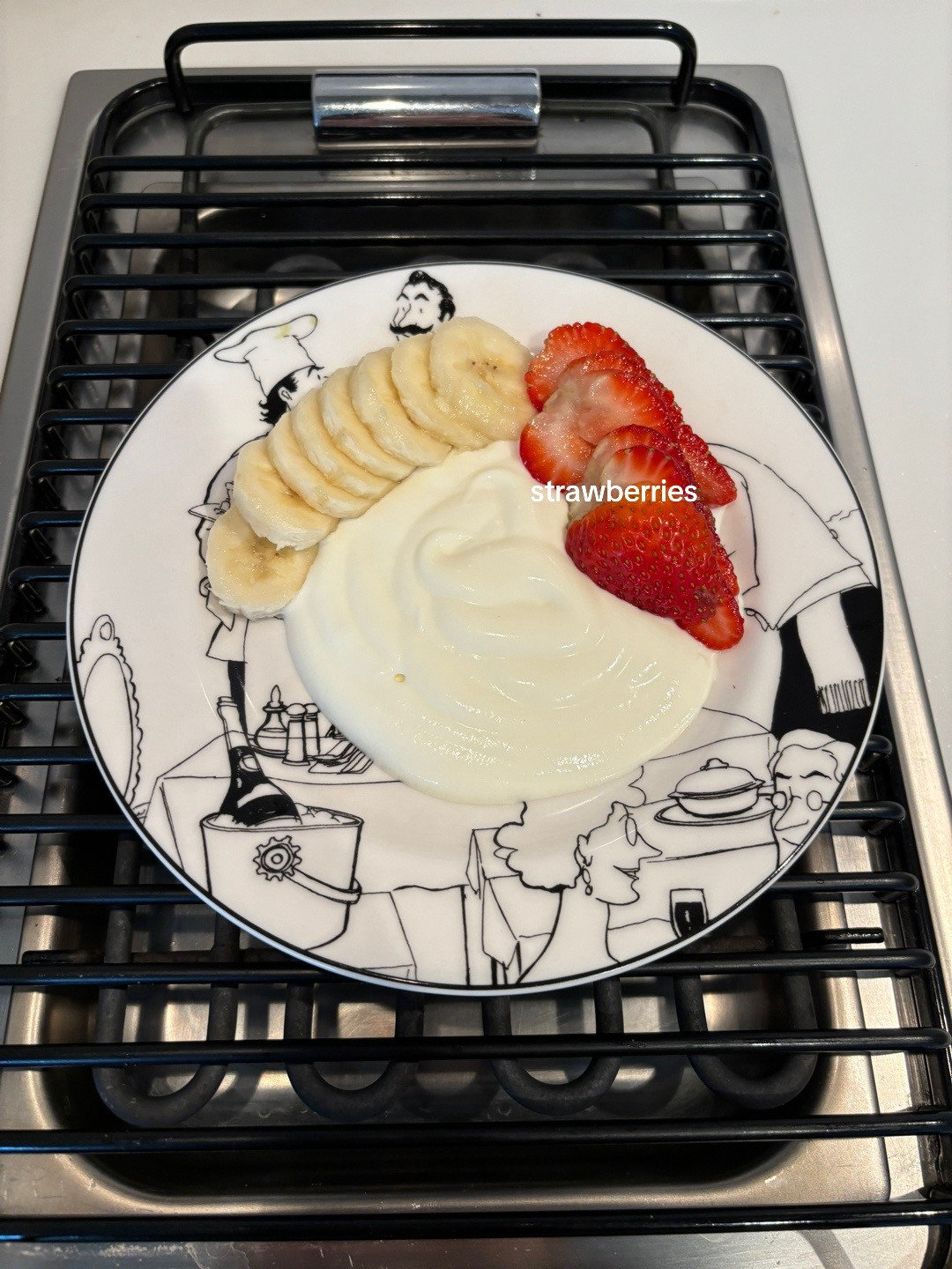 Healthy Yogurt Granola Bowl with Banana, Strawberries, Blueberries and Kiwi