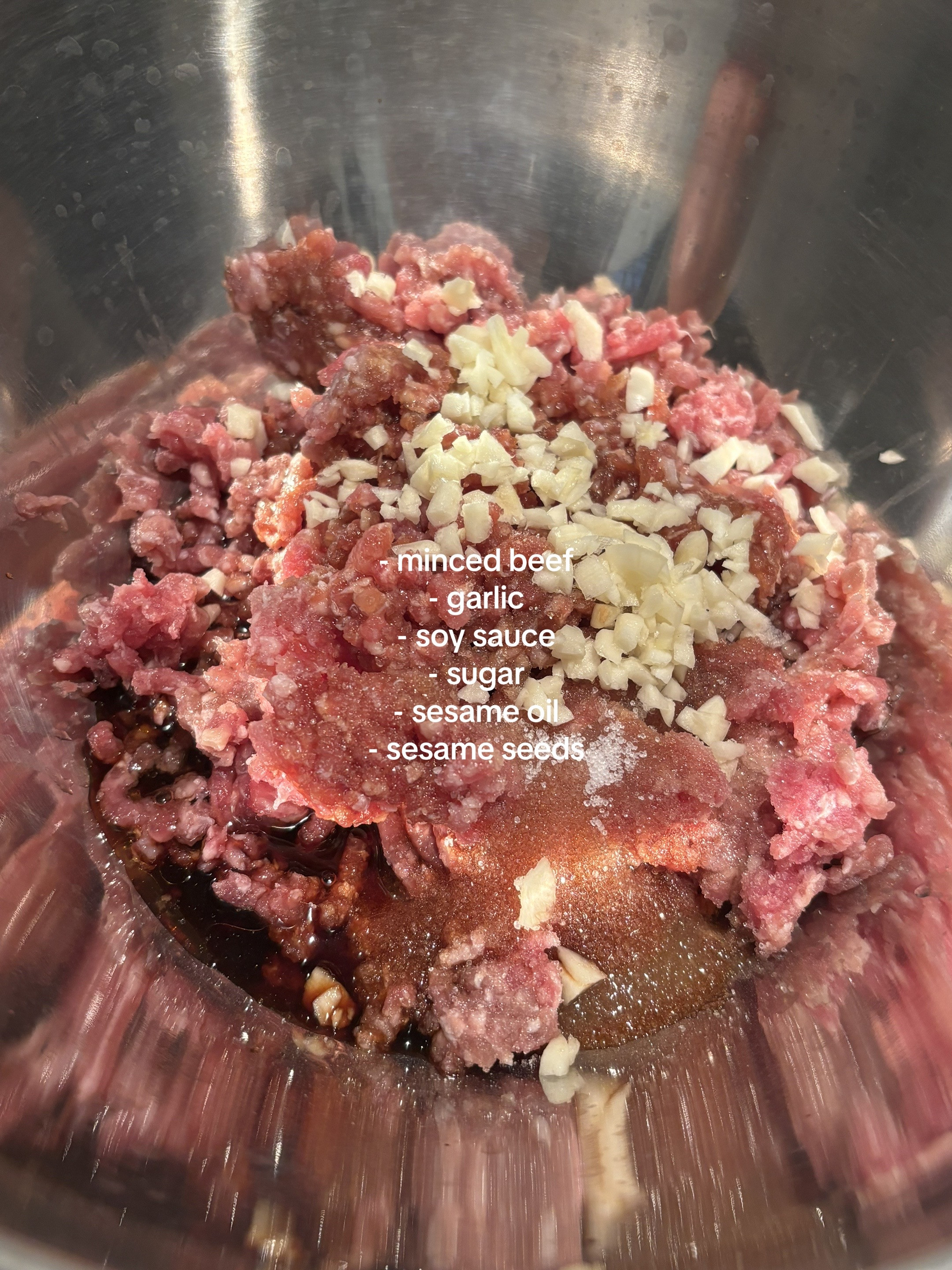 Homemade Beef Bibimbap with Gochujang Sauce, Kimchi, Spinach, Mushrooms and Fried Egg