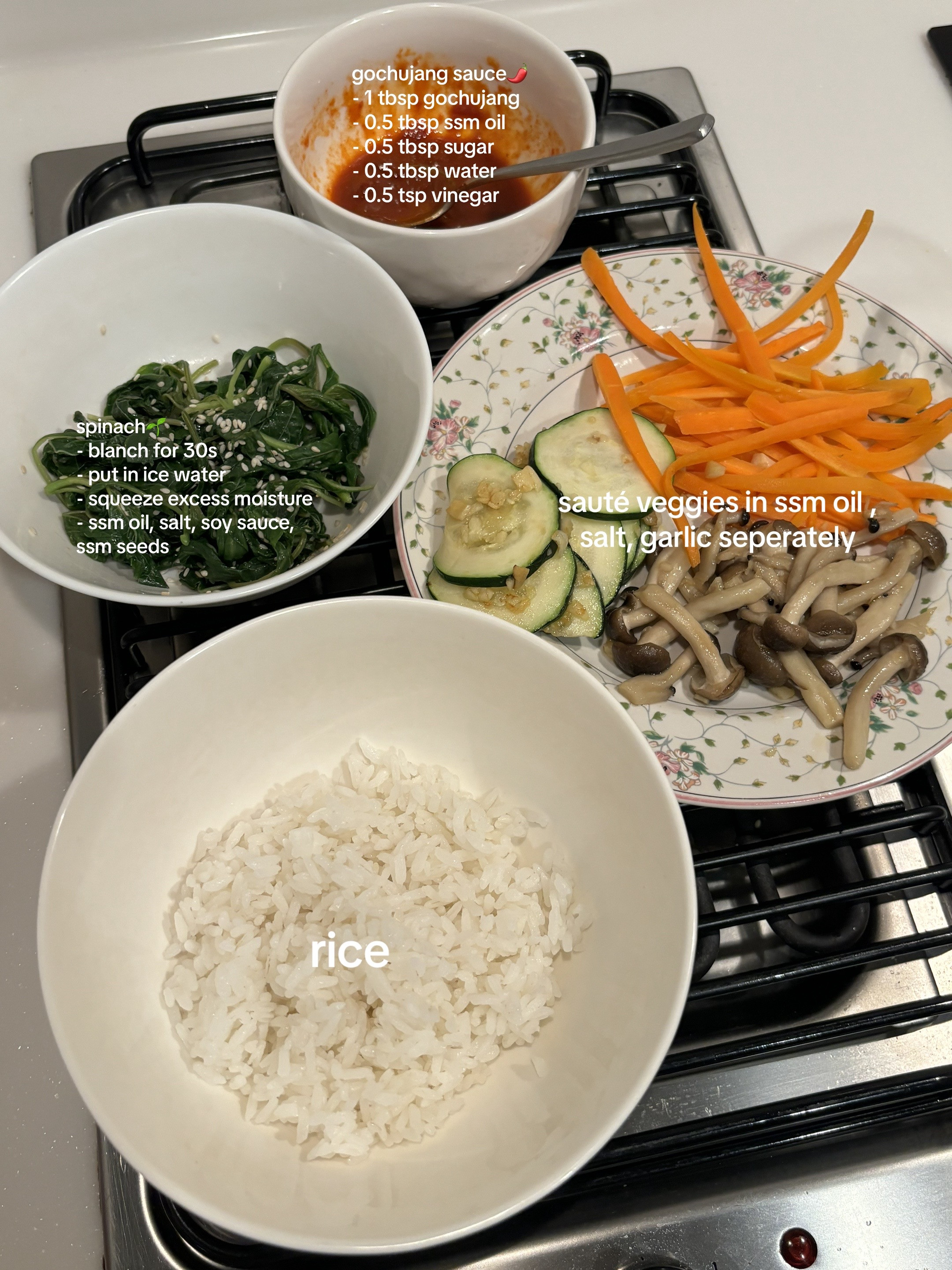 Homemade Beef Bibimbap with Gochujang Sauce, Kimchi, Spinach, Mushrooms and Fried Egg