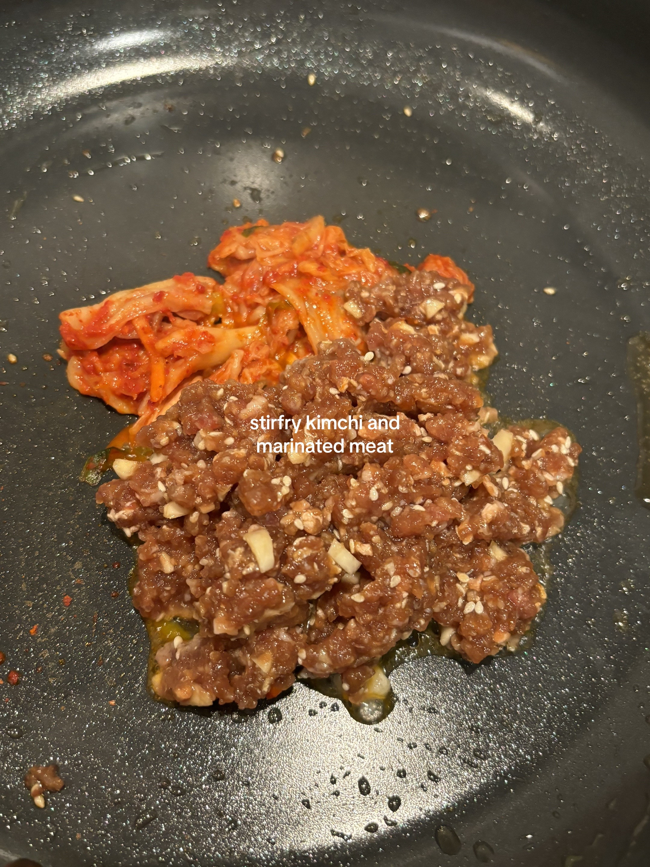 Homemade Beef Bibimbap with Gochujang Sauce, Kimchi, Spinach, Mushrooms and Fried Egg