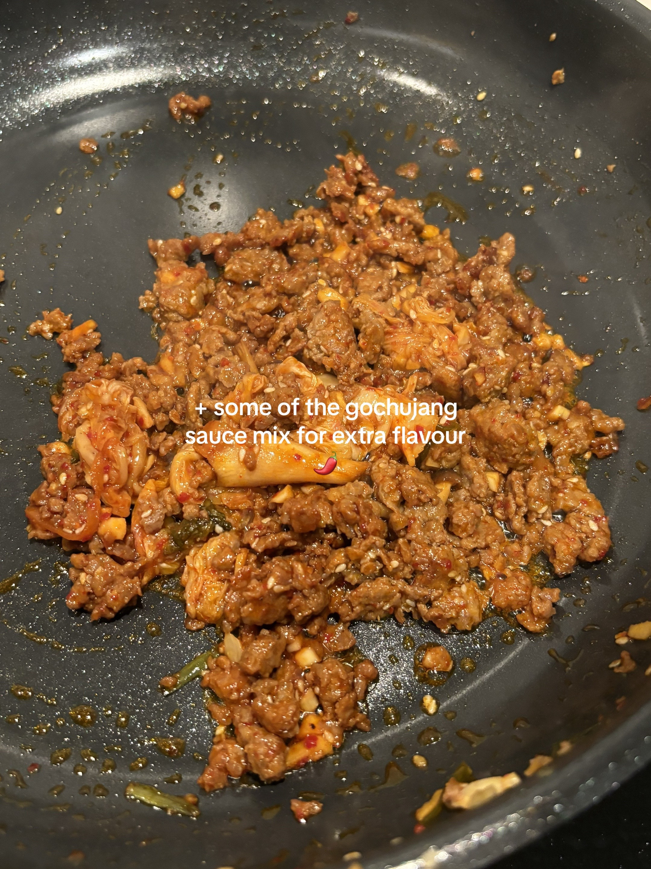 Homemade Beef Bibimbap with Gochujang Sauce, Kimchi, Spinach, Mushrooms and Fried Egg