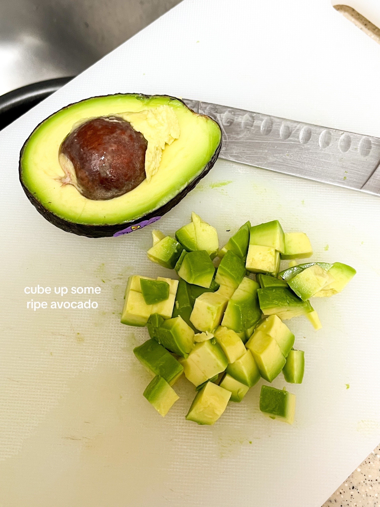 How to make a simple and nourishing onsen egg bowl with rice, avocado, furikake, garlic chips, and sesame