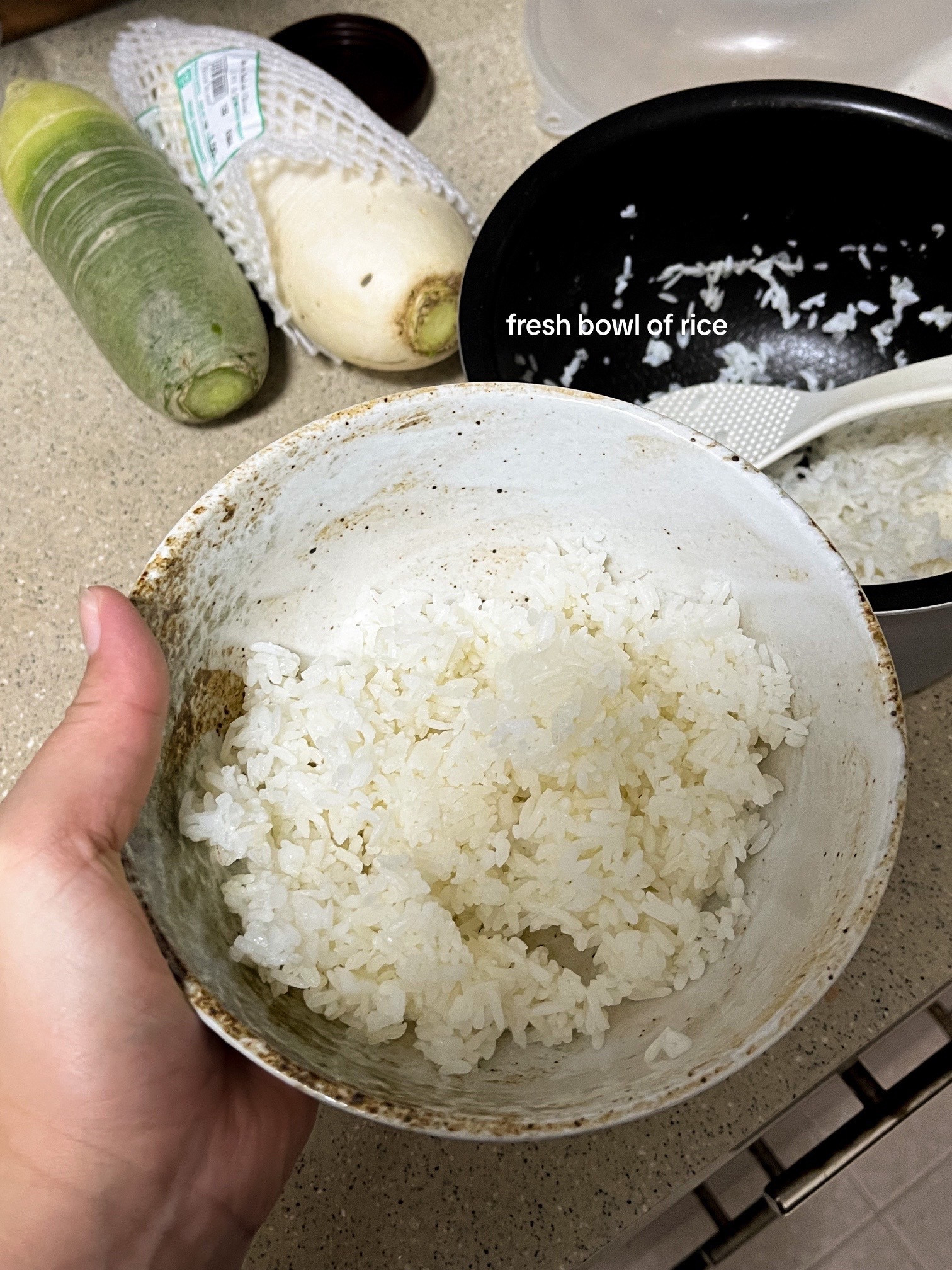 How to make a simple and nourishing onsen egg bowl with rice, avocado, furikake, garlic chips, and sesame