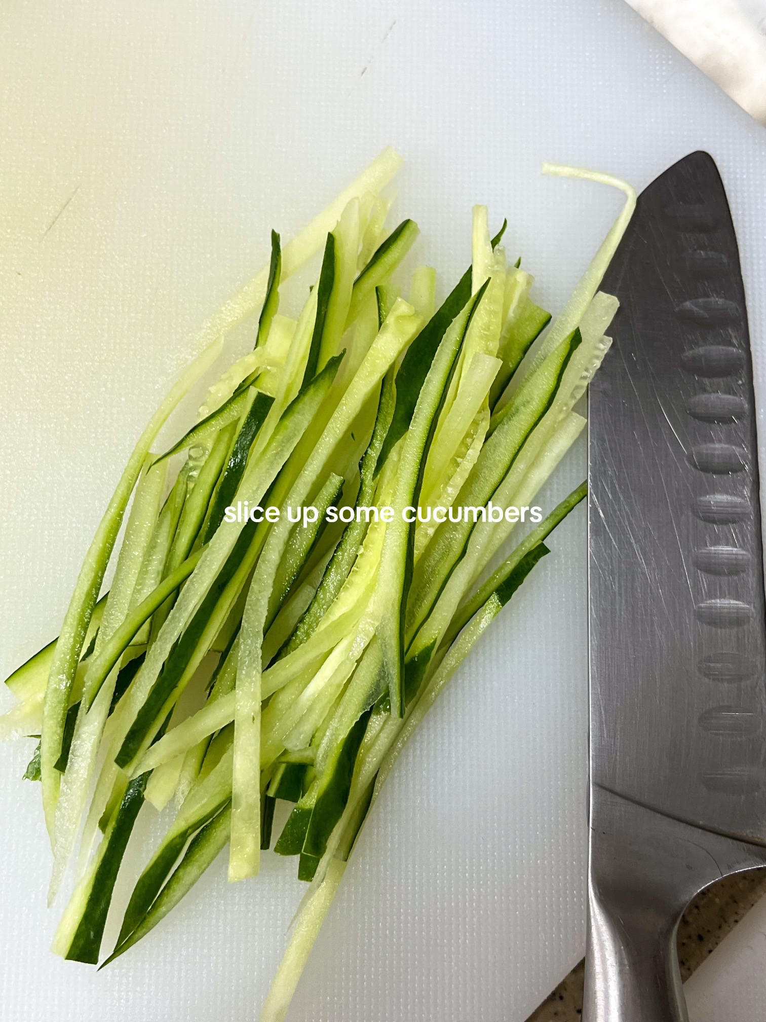 How to make Bibim Guksu: A quick and easy cold noodle dish with sliced cucumbers, soft-boiled eggs, and kimchi