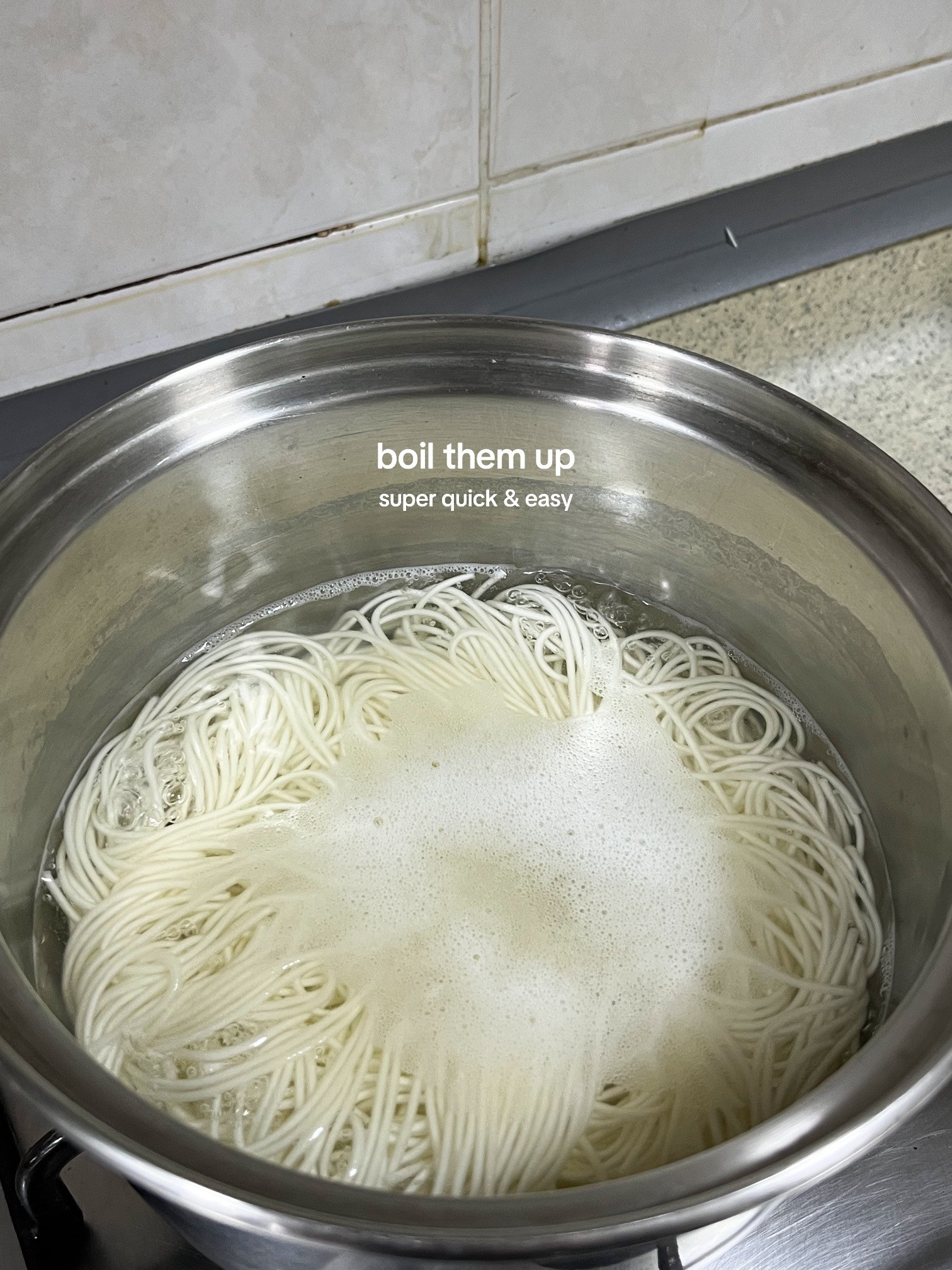 How to make Bibim Guksu: A quick and easy cold noodle dish with sliced cucumbers, soft-boiled eggs, and kimchi