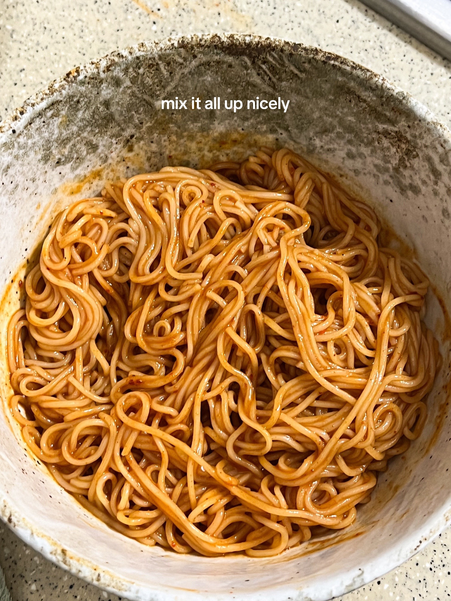 How to make Bibim Guksu: A quick and easy cold noodle dish with sliced cucumbers, soft-boiled eggs, and kimchi