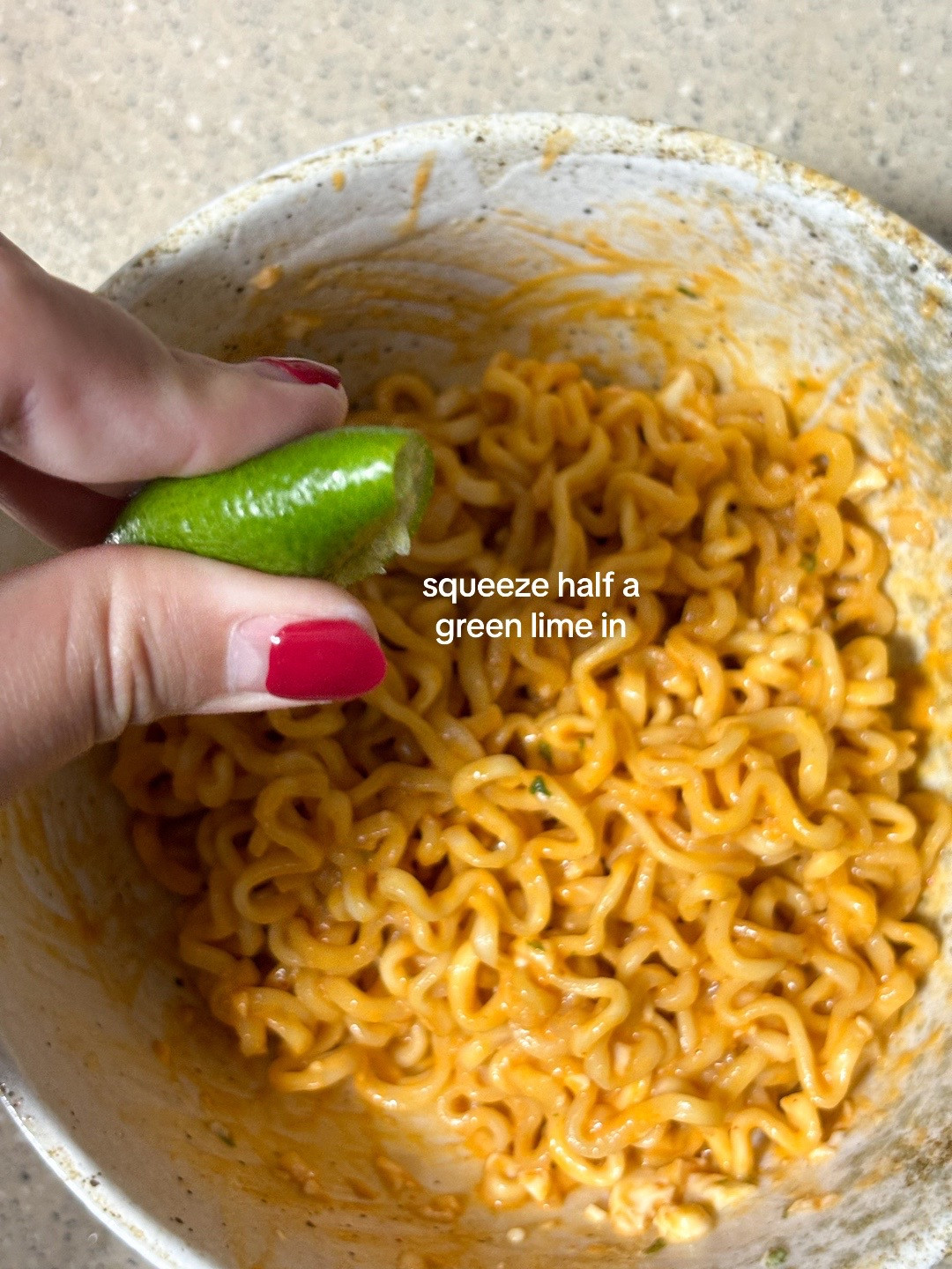 How to make Buldak Rose Ramen with lime, egg and green onions