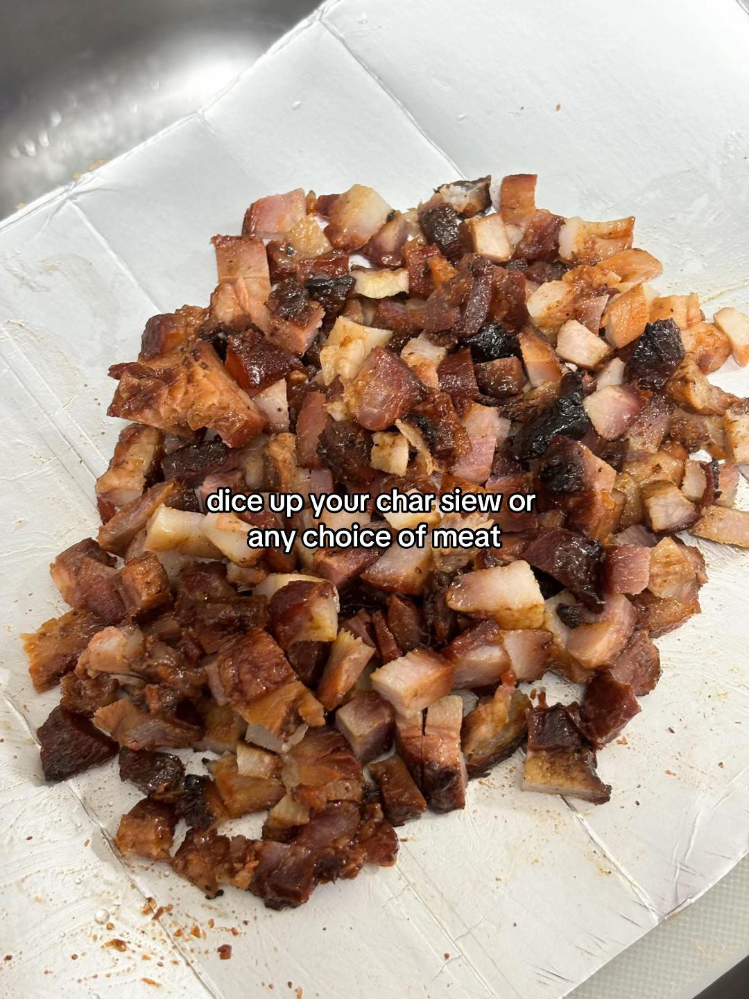 How to make delicious char siew fried rice with diced meat, garlic, onions, and scrambled eggs