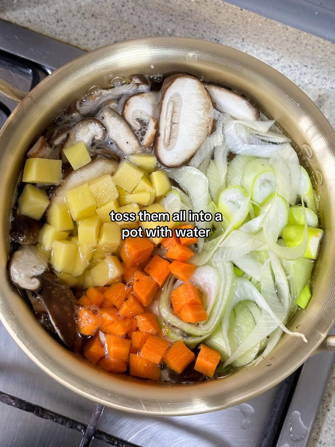 How to make Deonjang Stew with potatoes, carrots, scallions and shiitake mushrooms