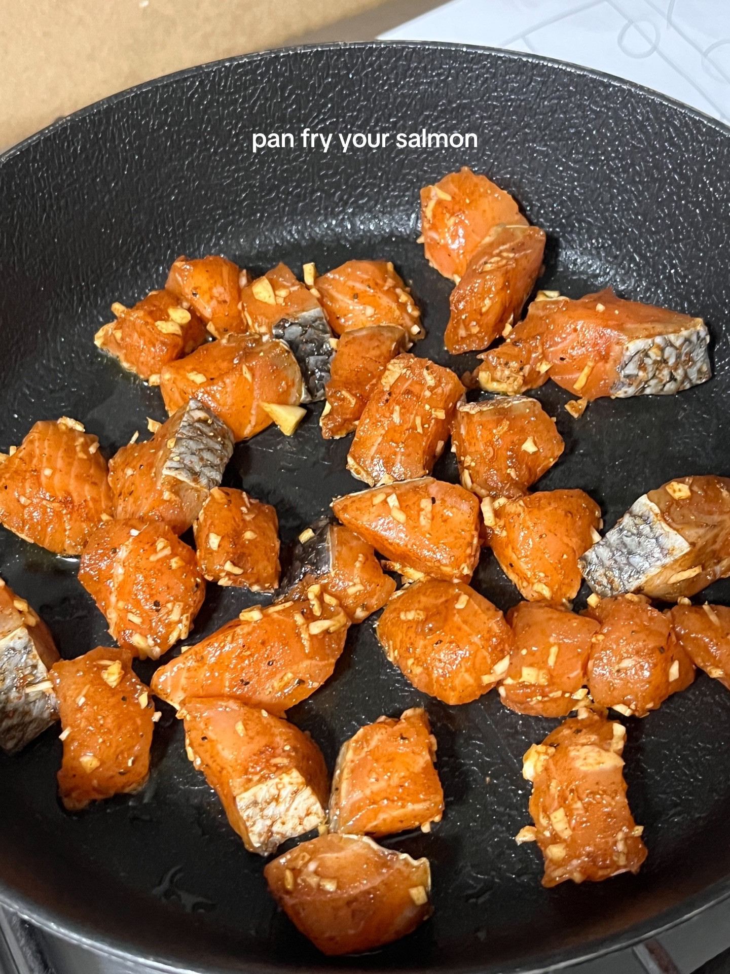 How to make honey sriracha salmon rice bowl with garlic, paprika, salt and pepper