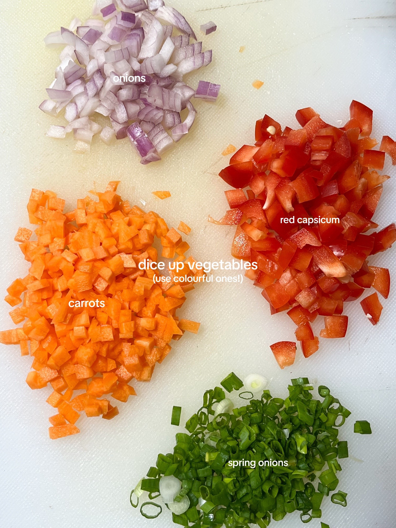 How to make Korean egg rolls with colorful diced vegetables, onions, and spring onions seasoned with sesame oil