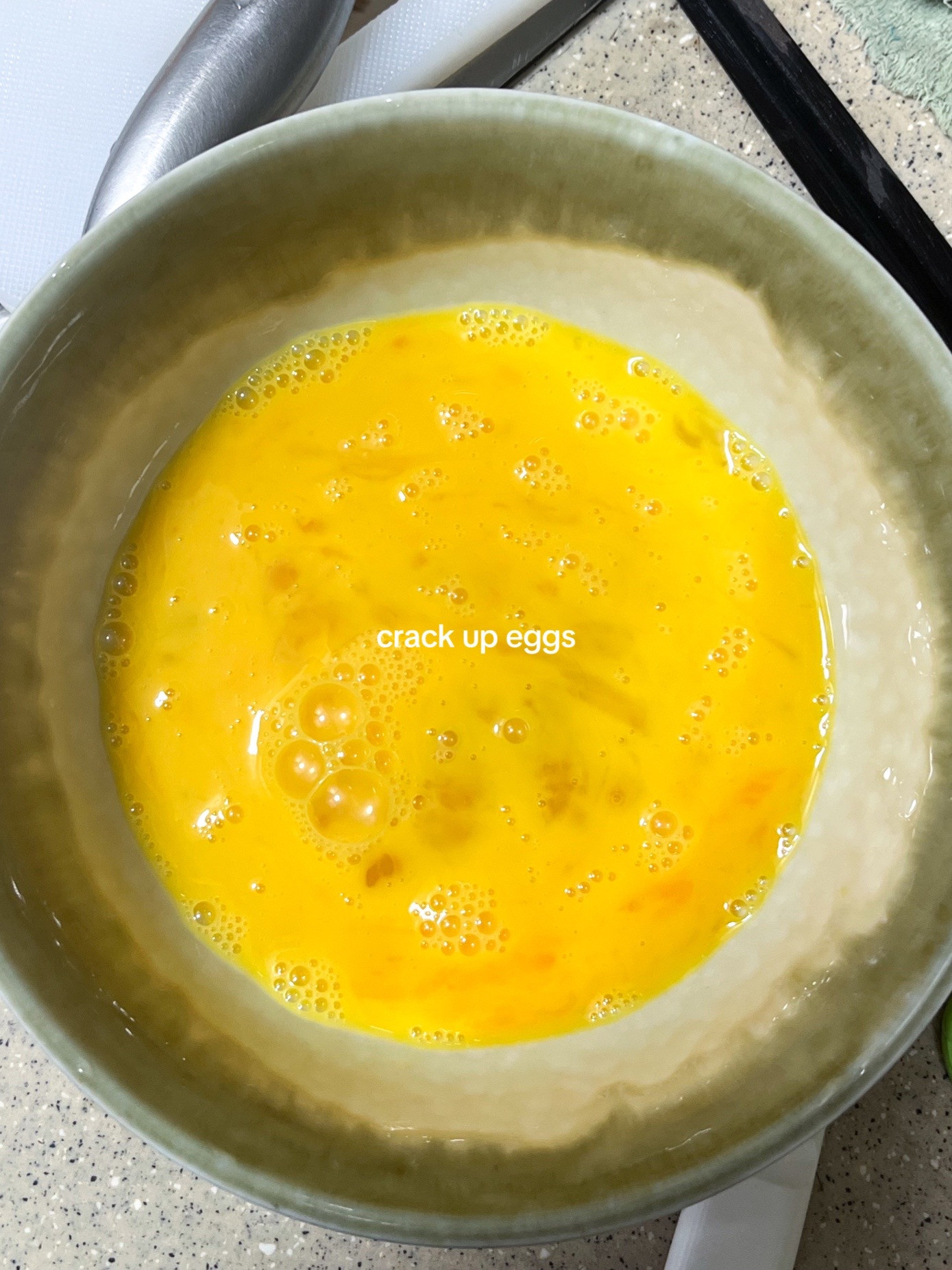 How to make Korean egg rolls with colorful diced vegetables, onions, and spring onions seasoned with sesame oil