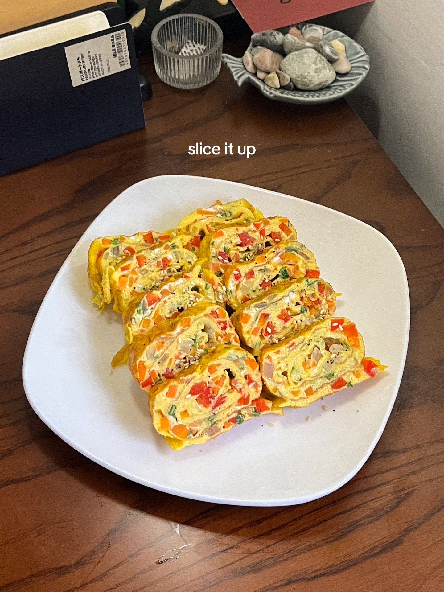 How to make Korean egg rolls with colorful diced vegetables, onions, and spring onions seasoned with sesame oil