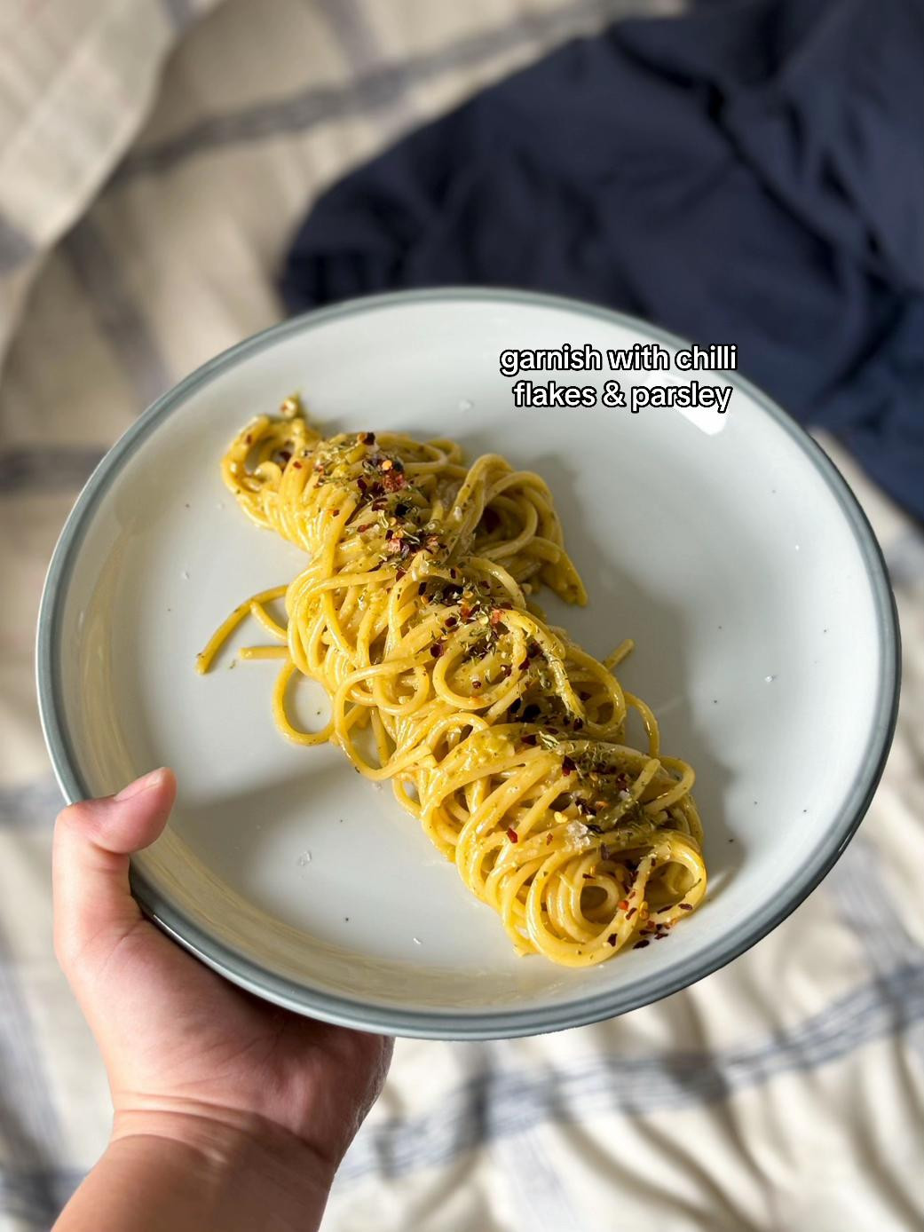 How to plate pesto pasta with minced garlic and Barilla Genovese sauce