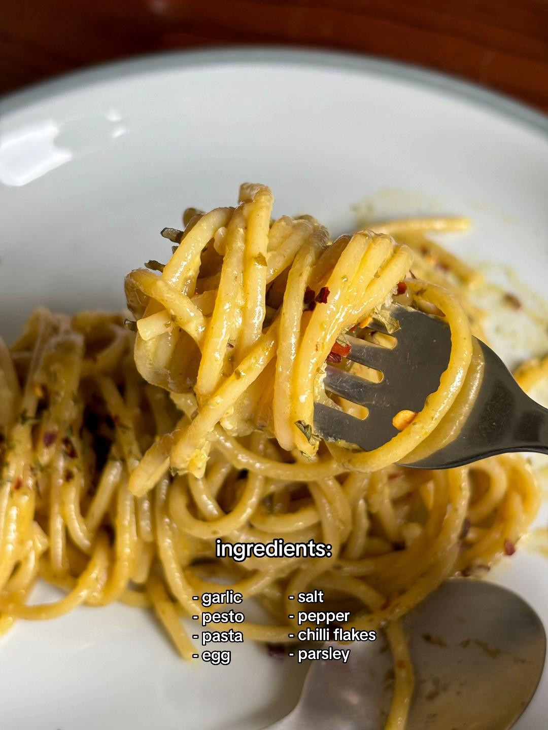 How to plate pesto pasta with minced garlic and Barilla Genovese sauce