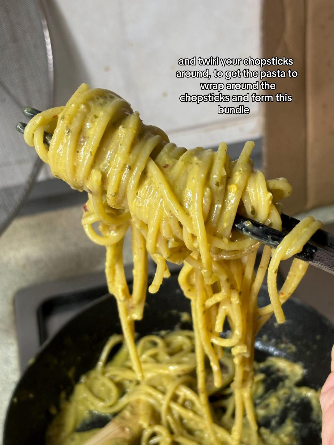 How to plate pesto pasta with minced garlic and Barilla Genovese sauce