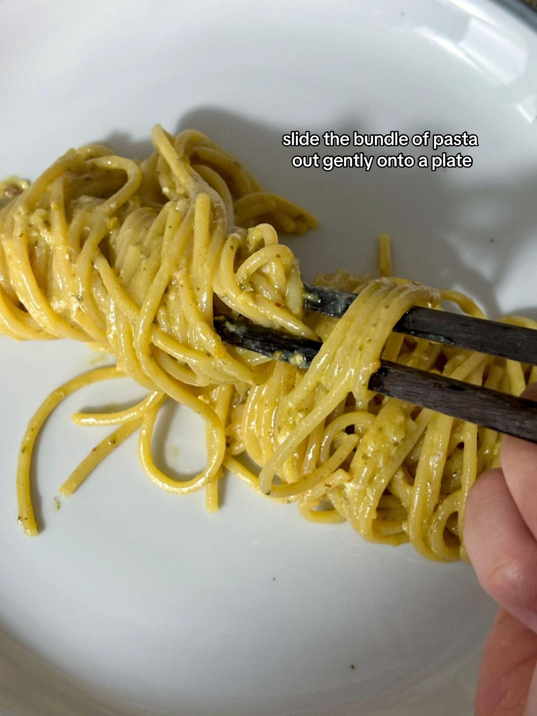 How to plate pesto pasta with minced garlic and Barilla Genovese sauce