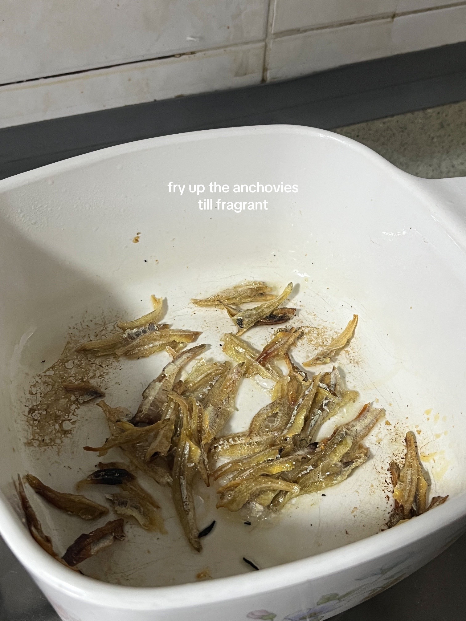 Make kimchi jjigae with me: Korean spicy tofu soup recipe using anchovies, kombu broth, scallions, onions and garlic